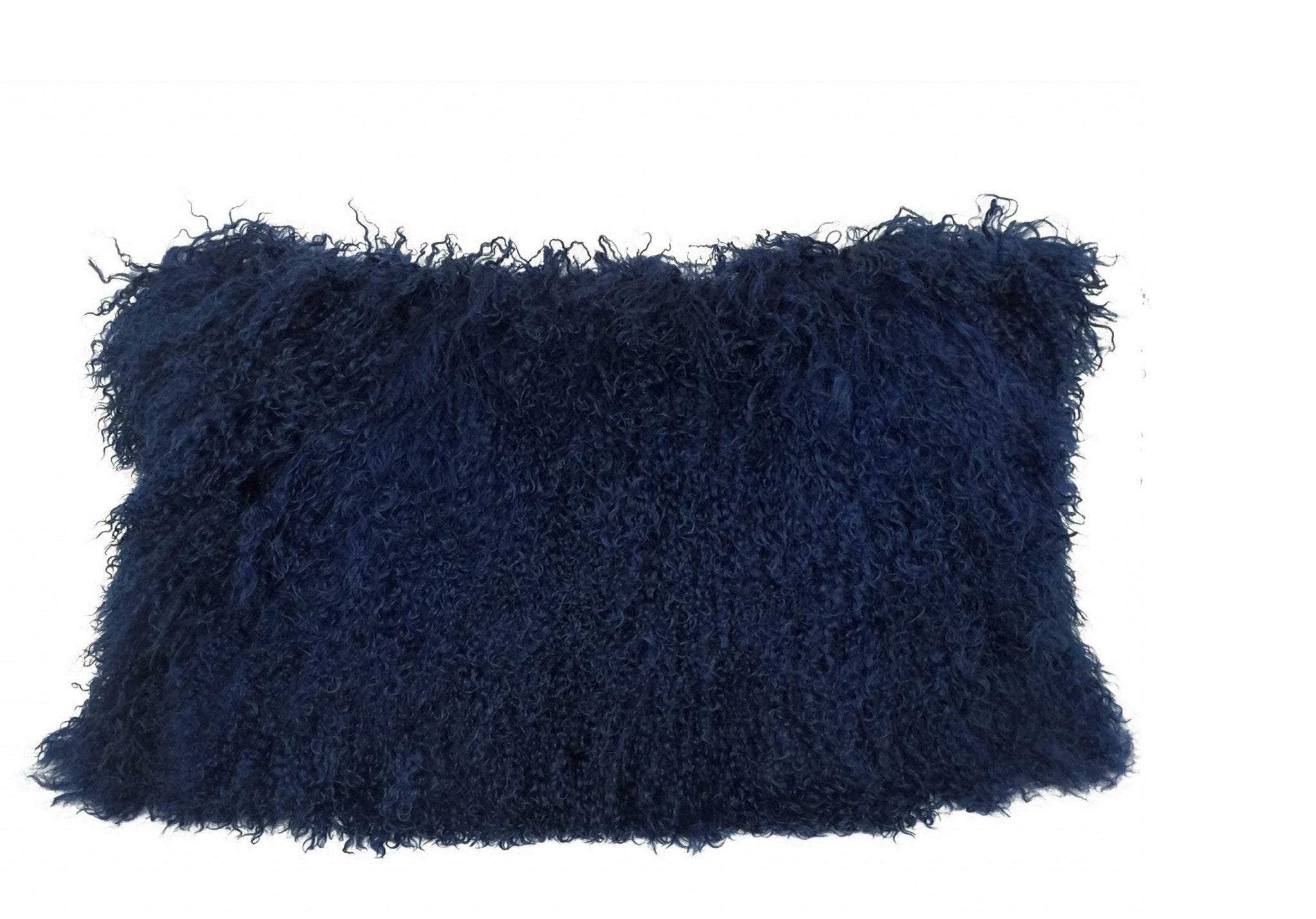 A luxurious 17-inch navy blue genuine Tibetan lamb fur pillow with a soft microsuede backing, elegantly displayed on a sofa.