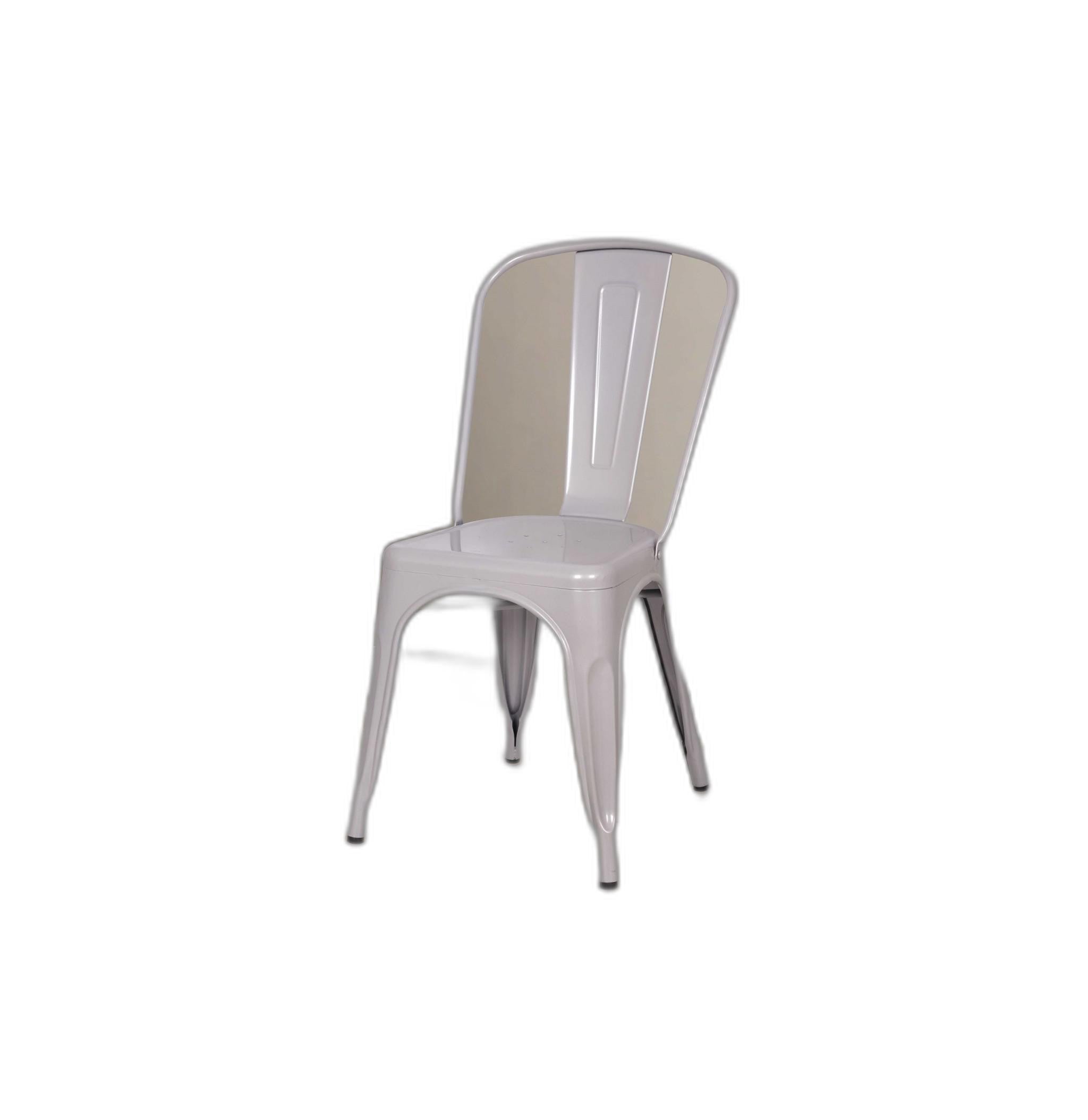 Set of two silver metal side chairs with rustic design, perfect for dining or casual settings.