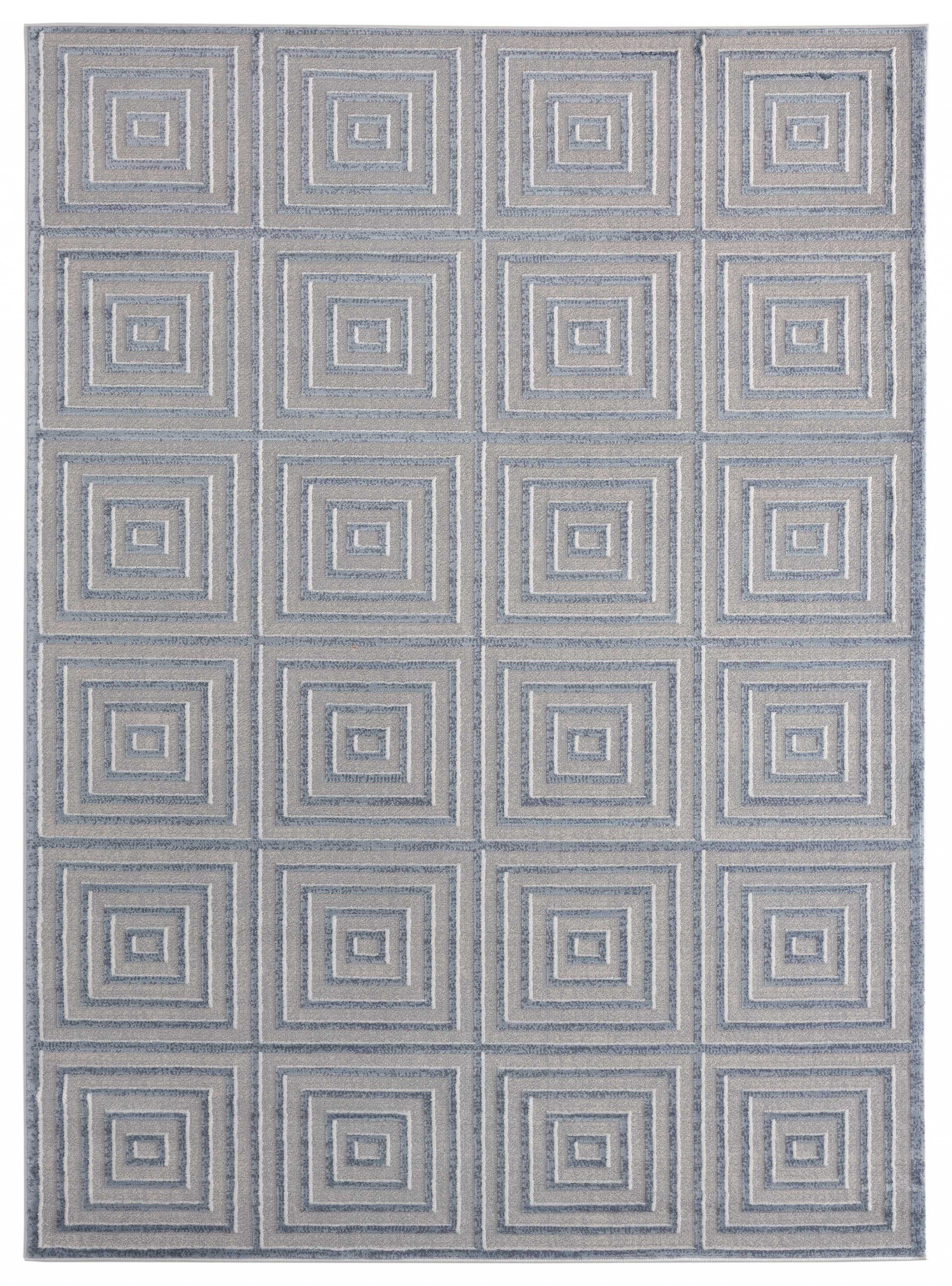 A large 118" x 158" blue and grey oversized rug featuring a modern geometric pattern, ideal for enhancing trendy room decor.