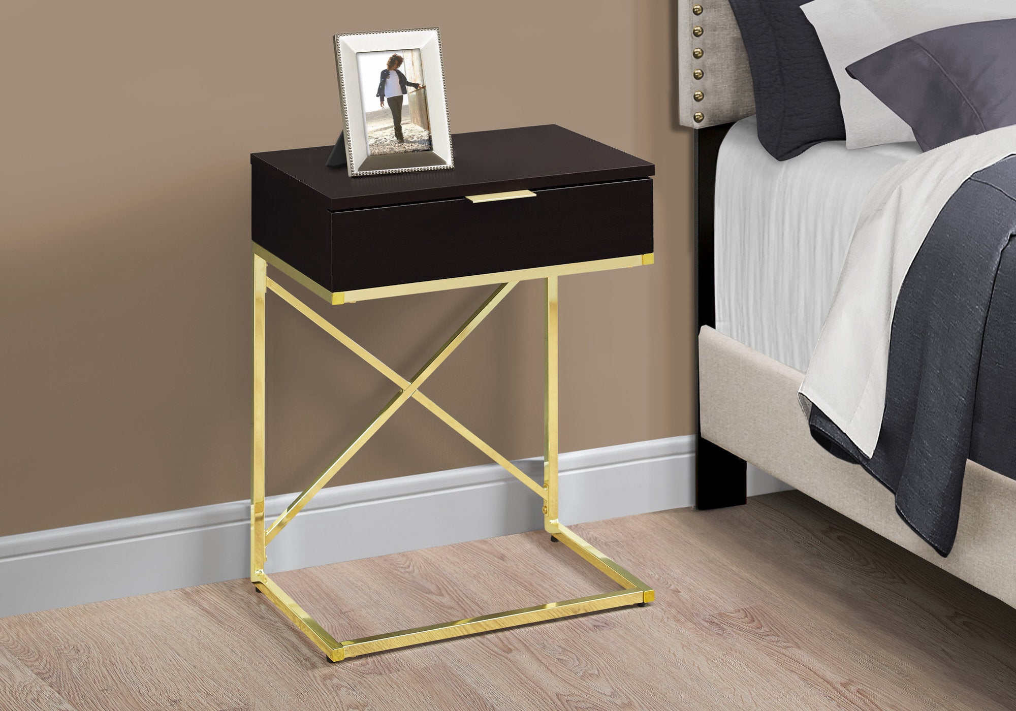 Elegant cappuccino finish gold metal accent table, perfect for living room decor.