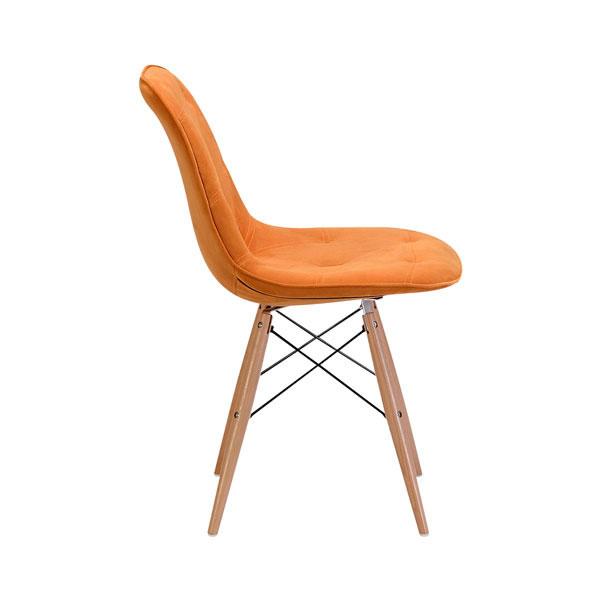 Elegant orange velour dining chair with stainless steel base and reclining feature, perfect for modern dining spaces.