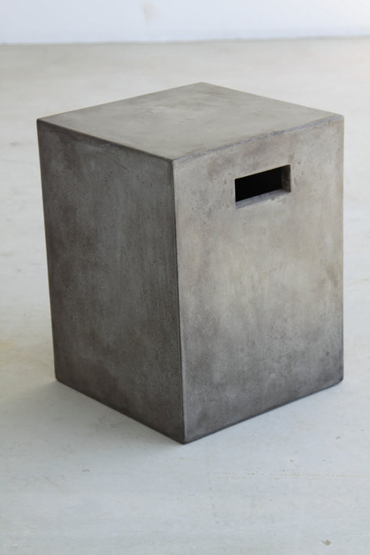 A stylish 18-inch concrete dining stool in dark grey, showcasing its modern design and durable construction.