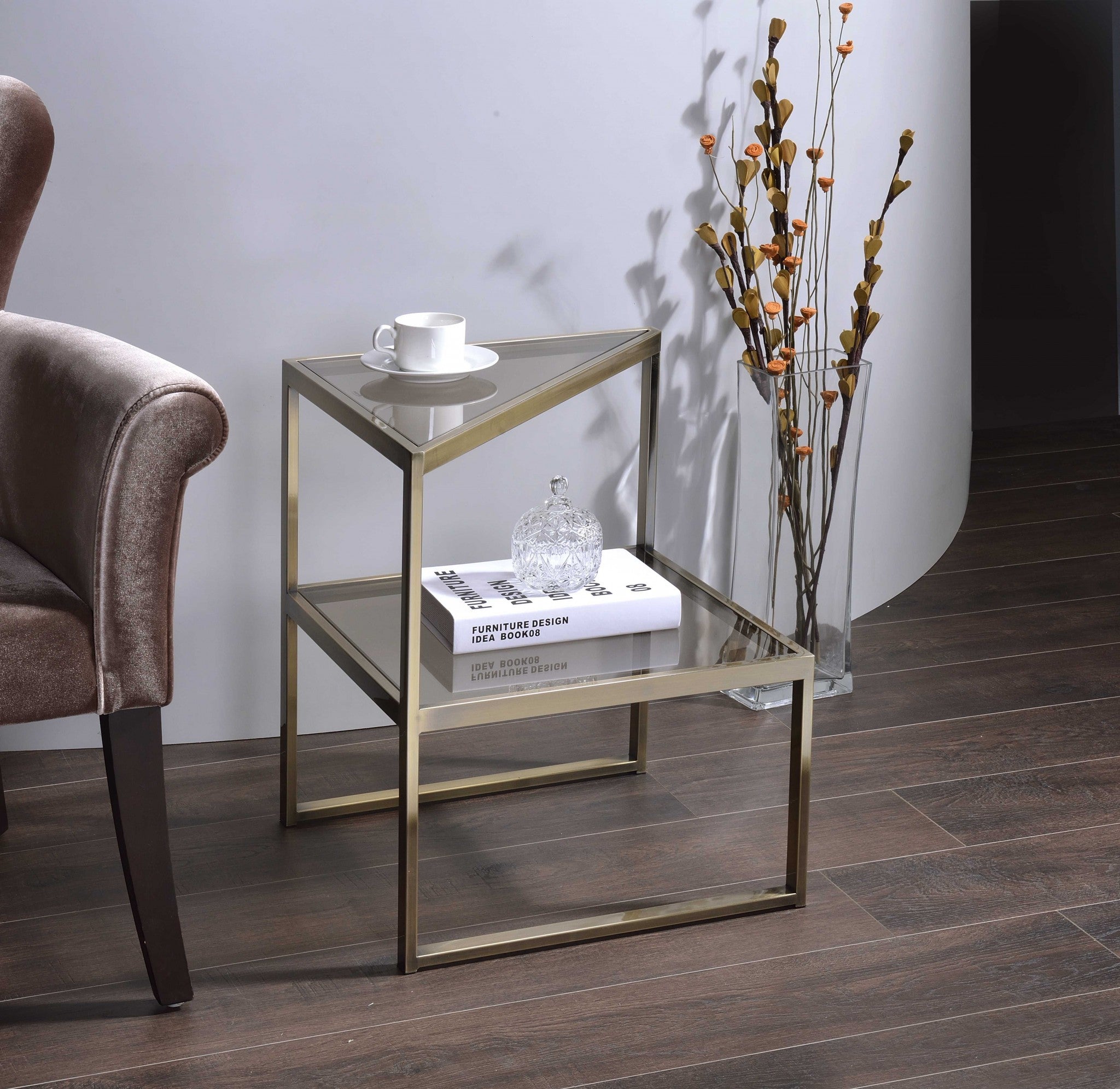 Antique brass metal end table with two-layer glass top and sturdy metal legs, perfect for living room or bedroom decor.