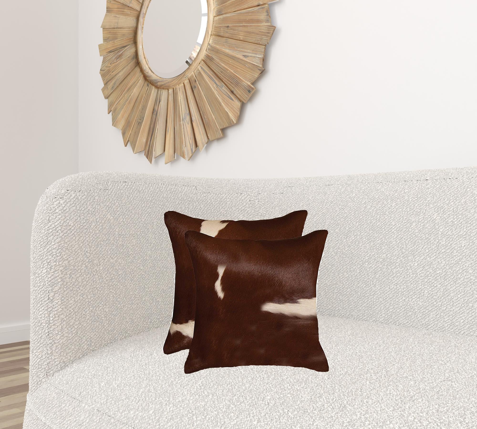 Luxurious 18x18 Gold and Chocolate Quattro Pillow set made from 100% Indian cowhide, featuring a hidden zipper and soft microsuede backing.