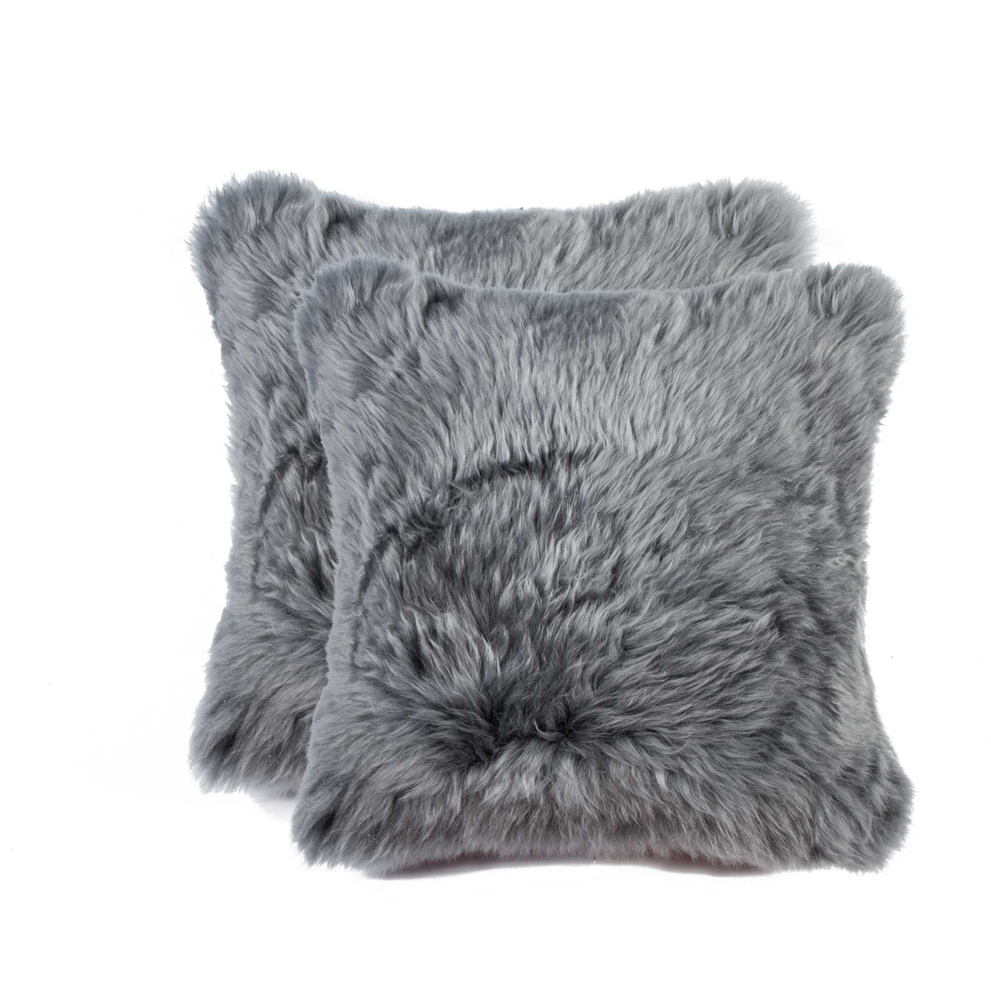 Two luxurious gray sheepskin pillows measuring 18x18 inches with soft microsuede backing, showcasing plush texture and hidden zipper closure.