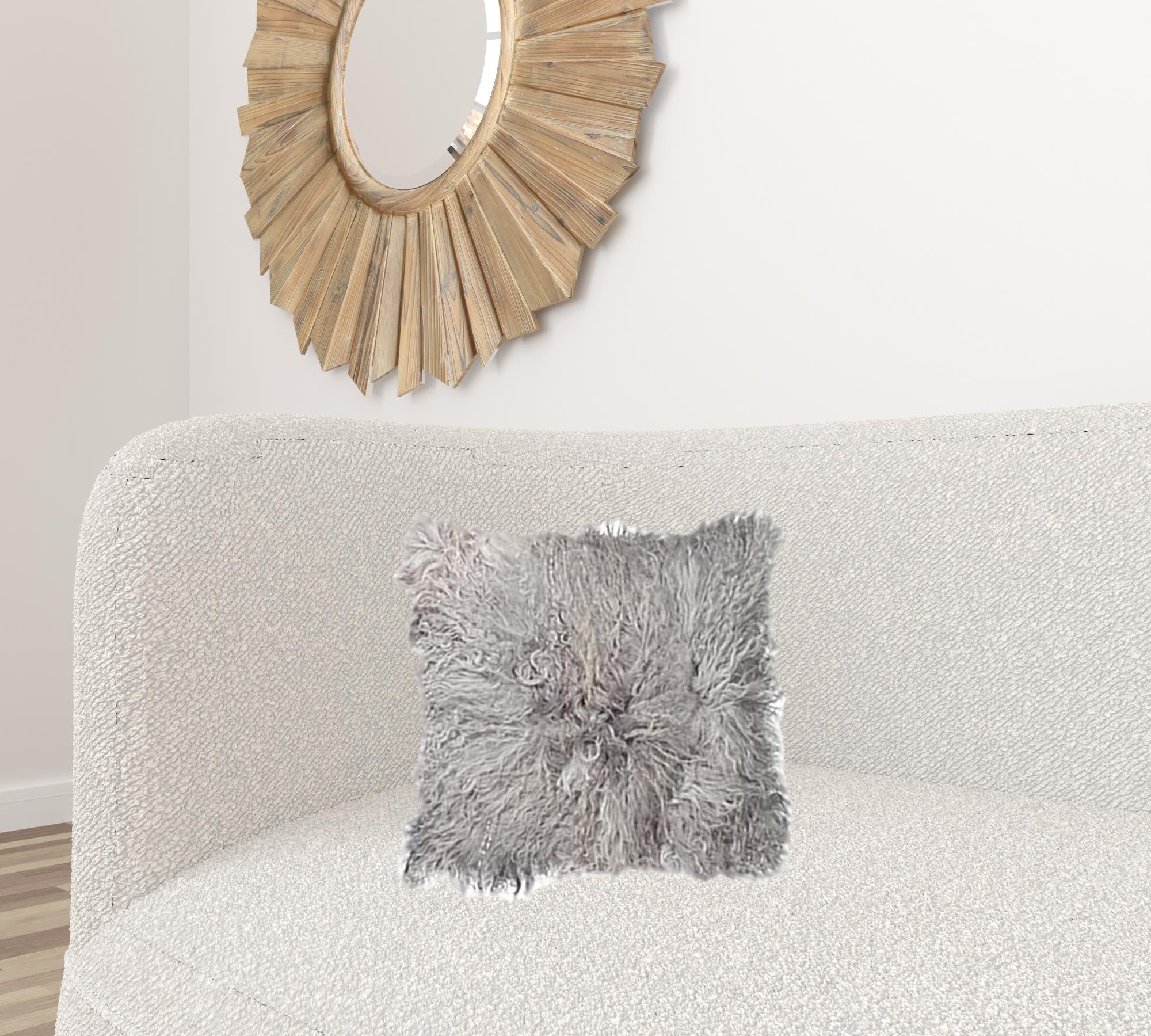 A luxurious gray sheepskin pillow measuring 18x18 inches, showcasing its soft texture and elegant design, perfect for home decor.