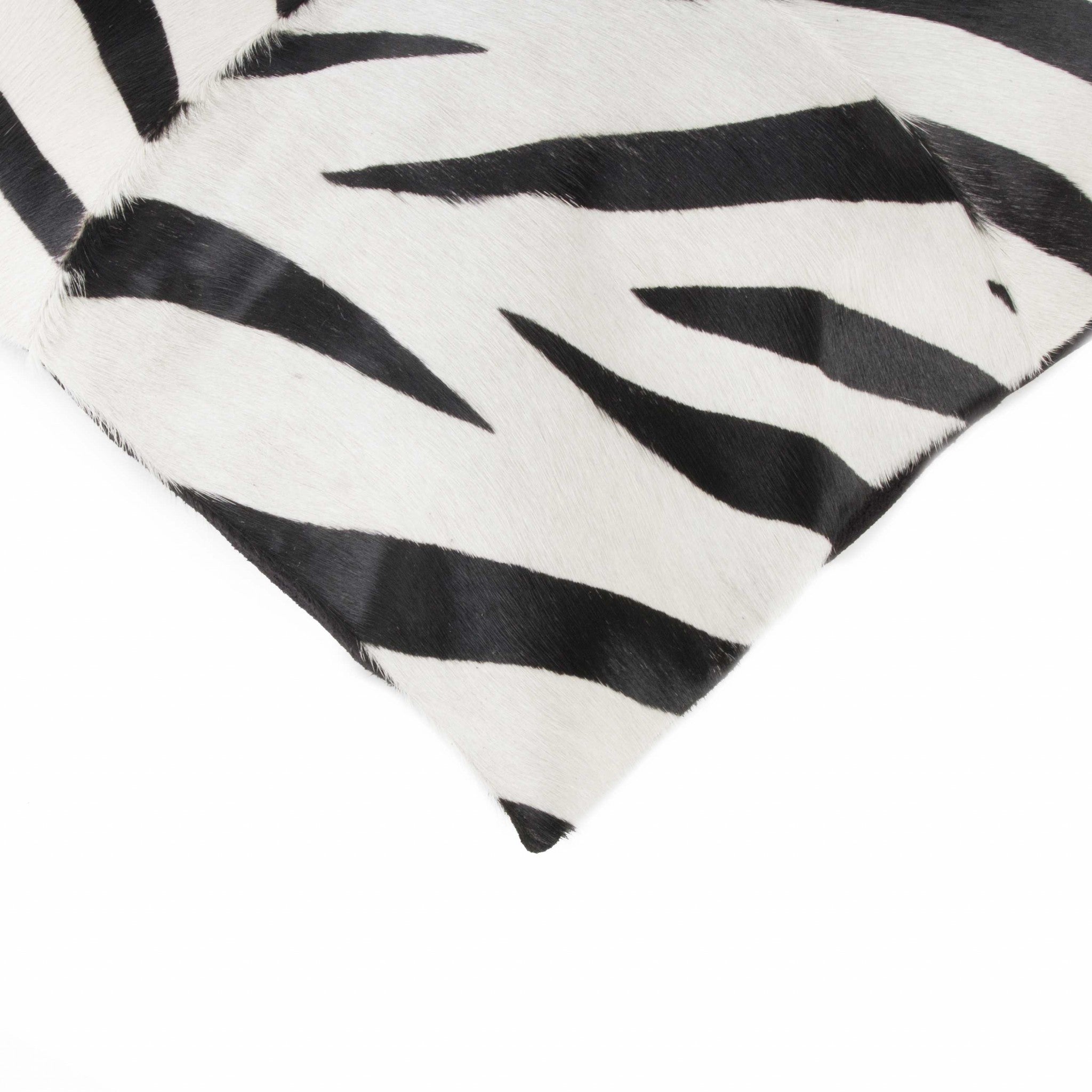 18x18 Zebra Black On White Quattro Pillow made from premium Indian cowhide with a hidden zipper closure.