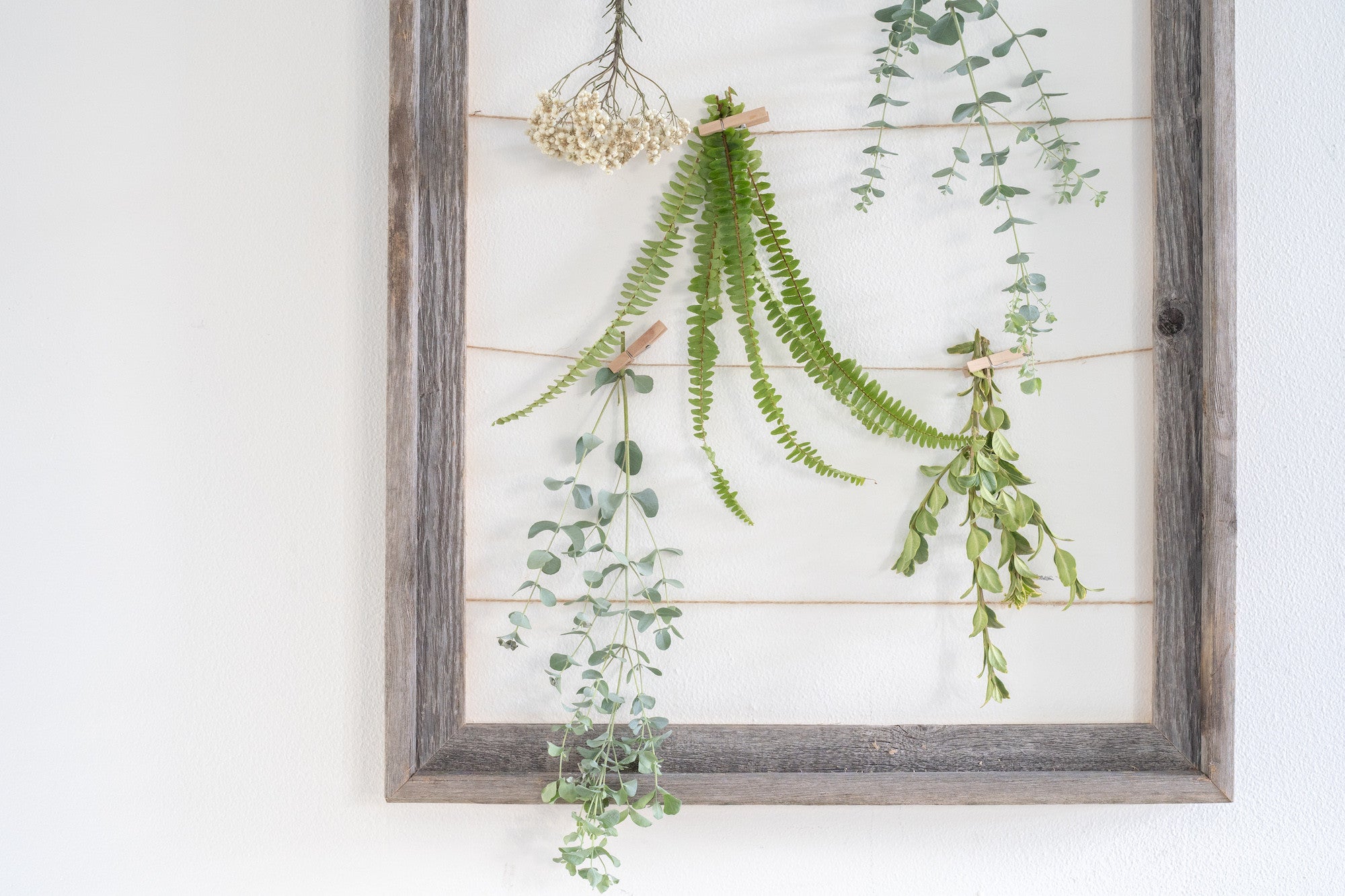 18x24 weathered grey picture frame made from reclaimed wood with sawtooth hangers, showcasing a rustic design perfect for home decor.