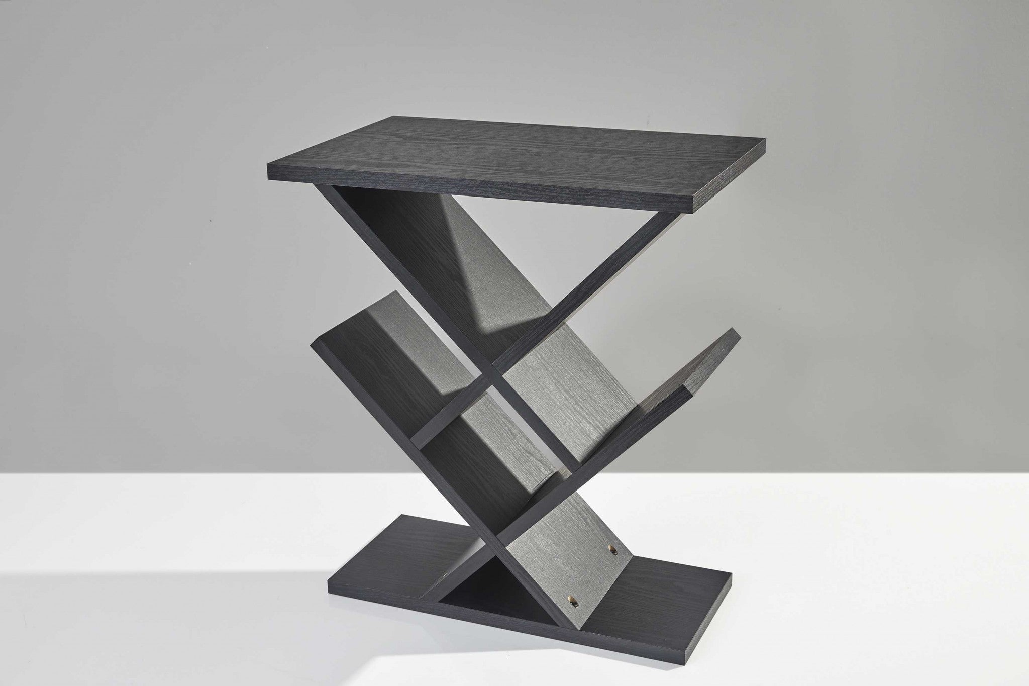 A sleek black accent table measuring 19x12x21.5 inches, featuring 8 deep storage compartments and a modern design.