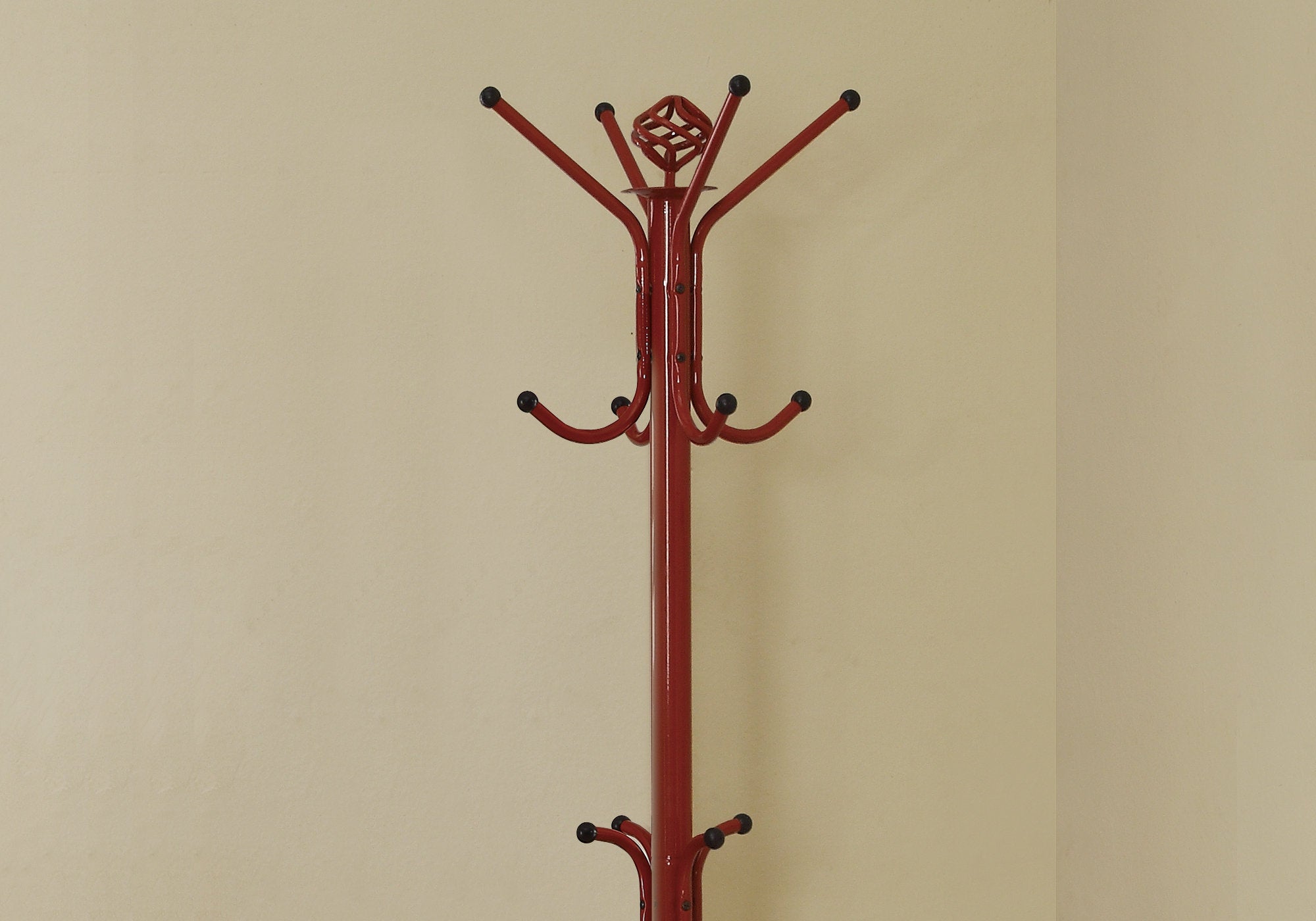 A vibrant red metal coat rack standing 70 inches tall, featuring a contemporary design suitable for entryways and small spaces.