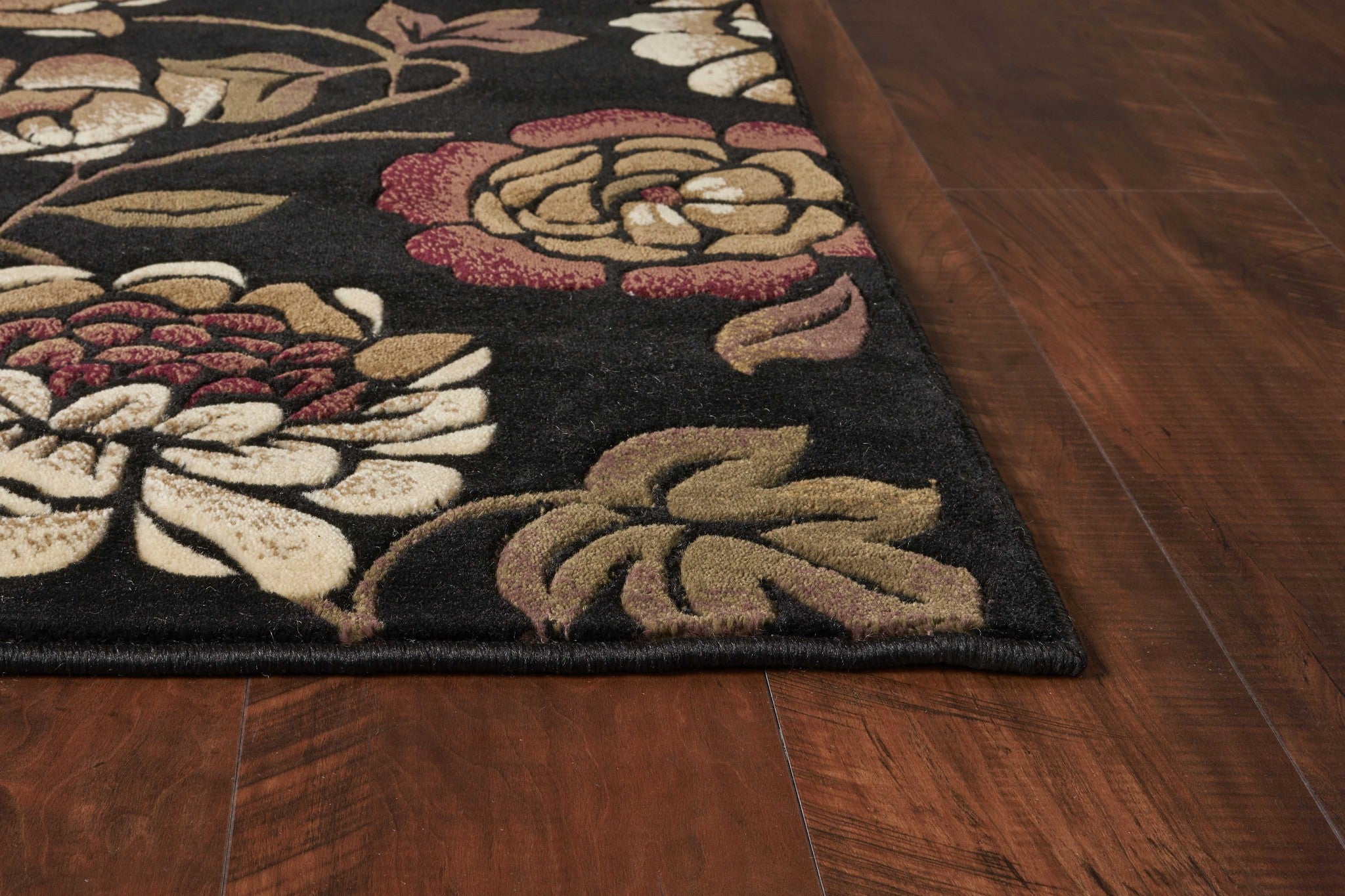 1 inch x 2 inches Black Polypropylene Area Rug featuring classic floral patterns and a durable design, perfect for enhancing home decor.