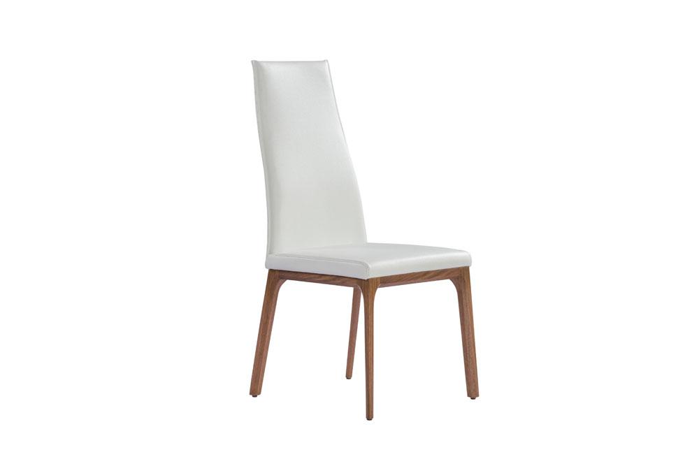 Stylish 20" X 25" X 43" white faux leather dining chair with metal frame, perfect for modern interiors.