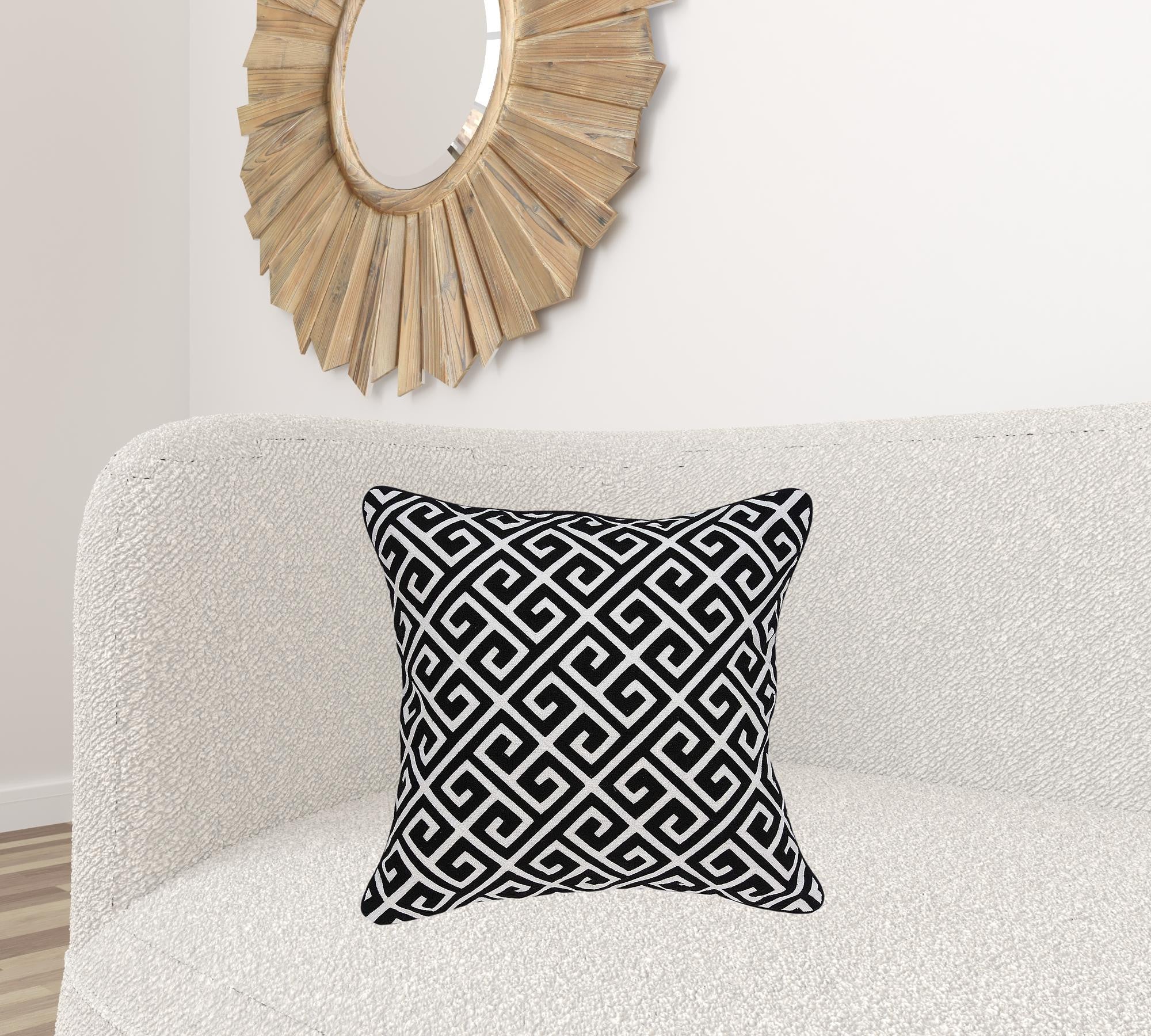 A stylish 20x7x20 inches black and white pillow featuring a Greek Key pattern, perfect for home decor.