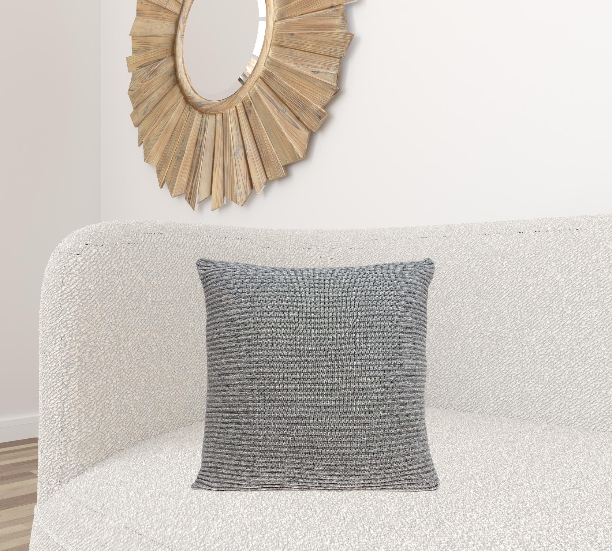 Elegant transitional gray pillow cover measuring 20x7x20 inches, made from 100% cotton, showcasing a soft and stylish design.