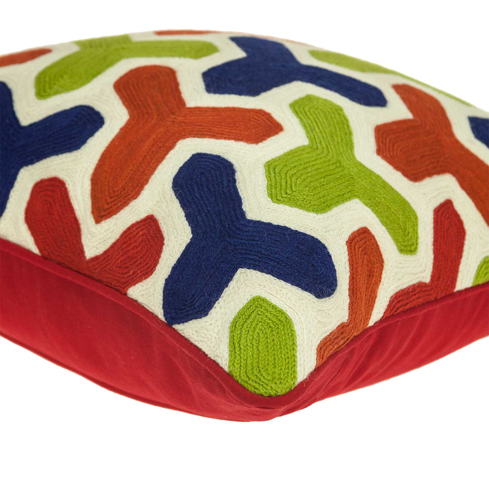 Handmade transitional pillow cover in red and blue, showcasing a multicolored knitted design, perfect for home decor.