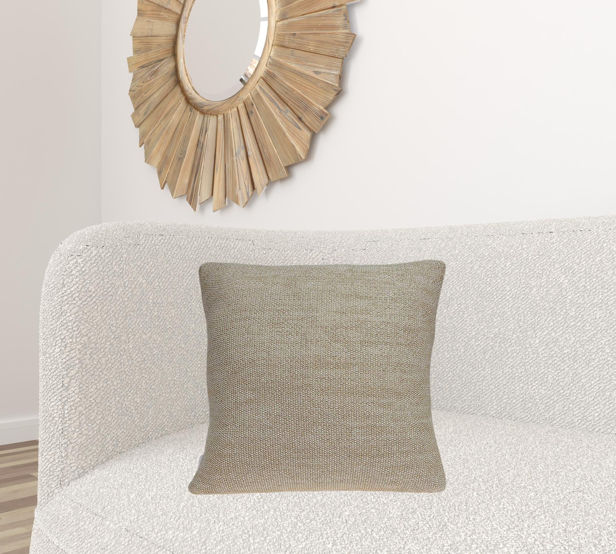 A stunning tan accent pillow measuring 20x7x20 inches, made from 100% cotton, showcasing a soft and elegant design.