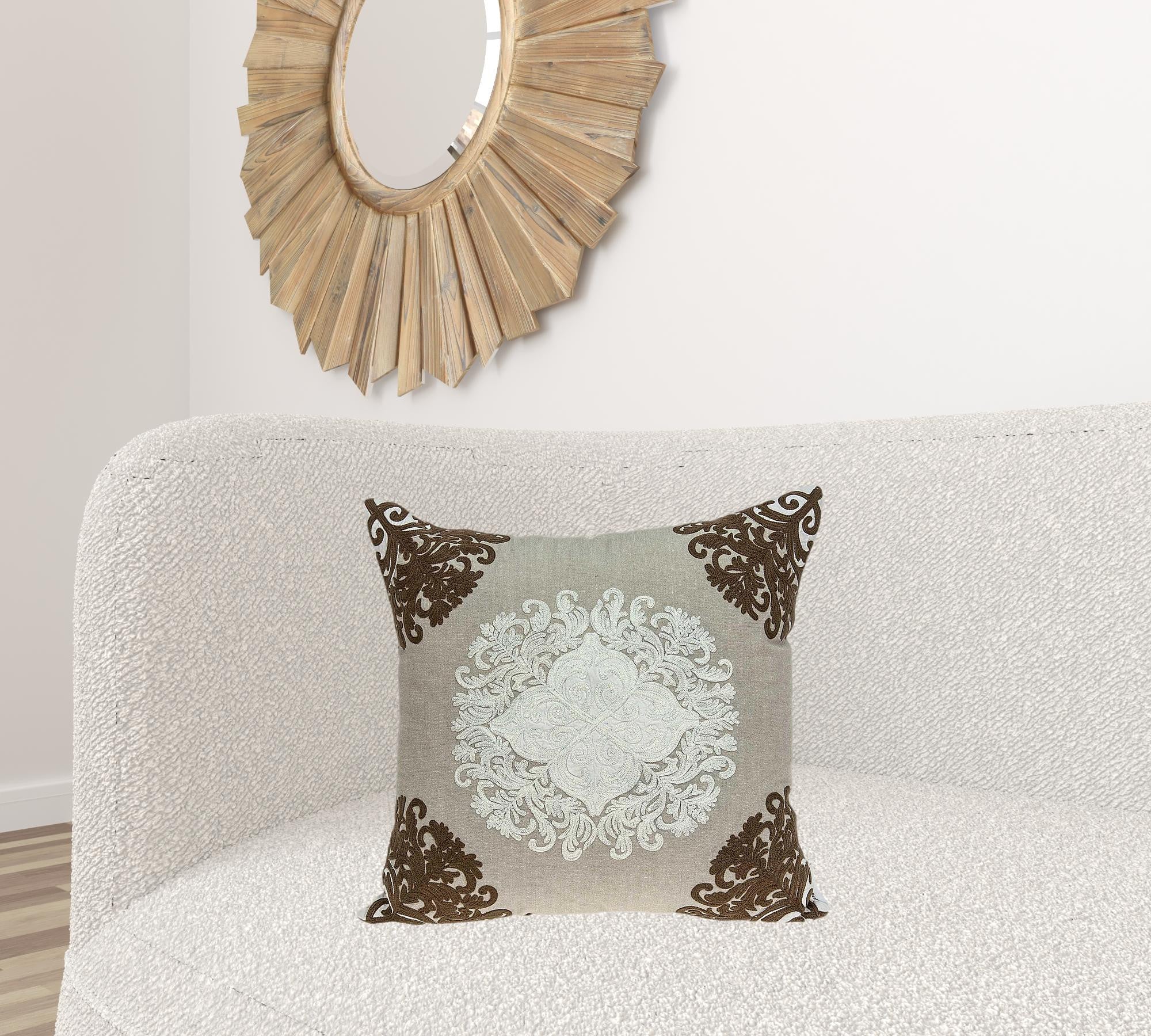 Traditional beige pillow cover measuring 20x7x20 inches with a polyfill insert, featuring a classic damask pattern.