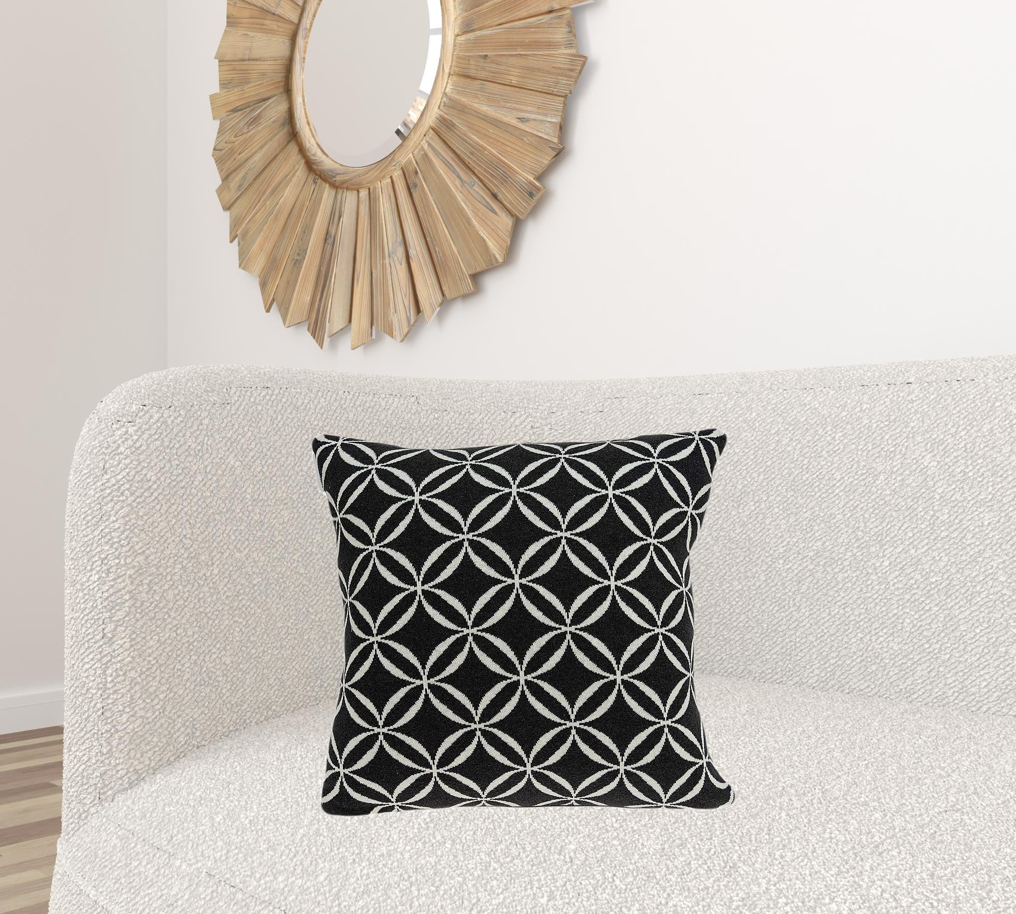 Transitional black pillow cover measuring 20x7x20 inches, made from 100% cotton, featuring a sleek design suitable for various home decors.