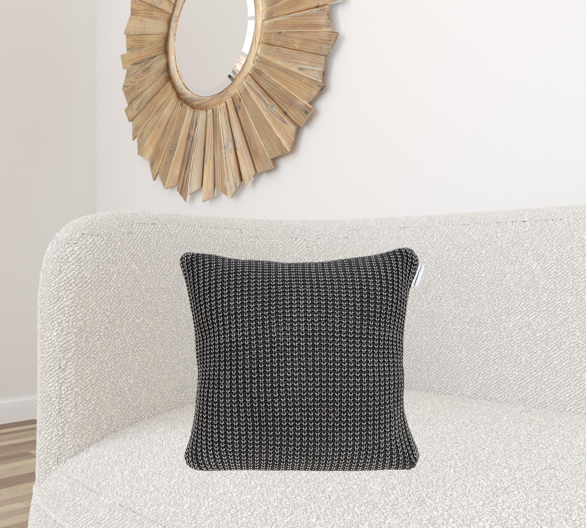 Transitional charcoal pillow cover measuring 20x7x20 inches, made from 100% cotton, featuring a soft texture and stylish design.