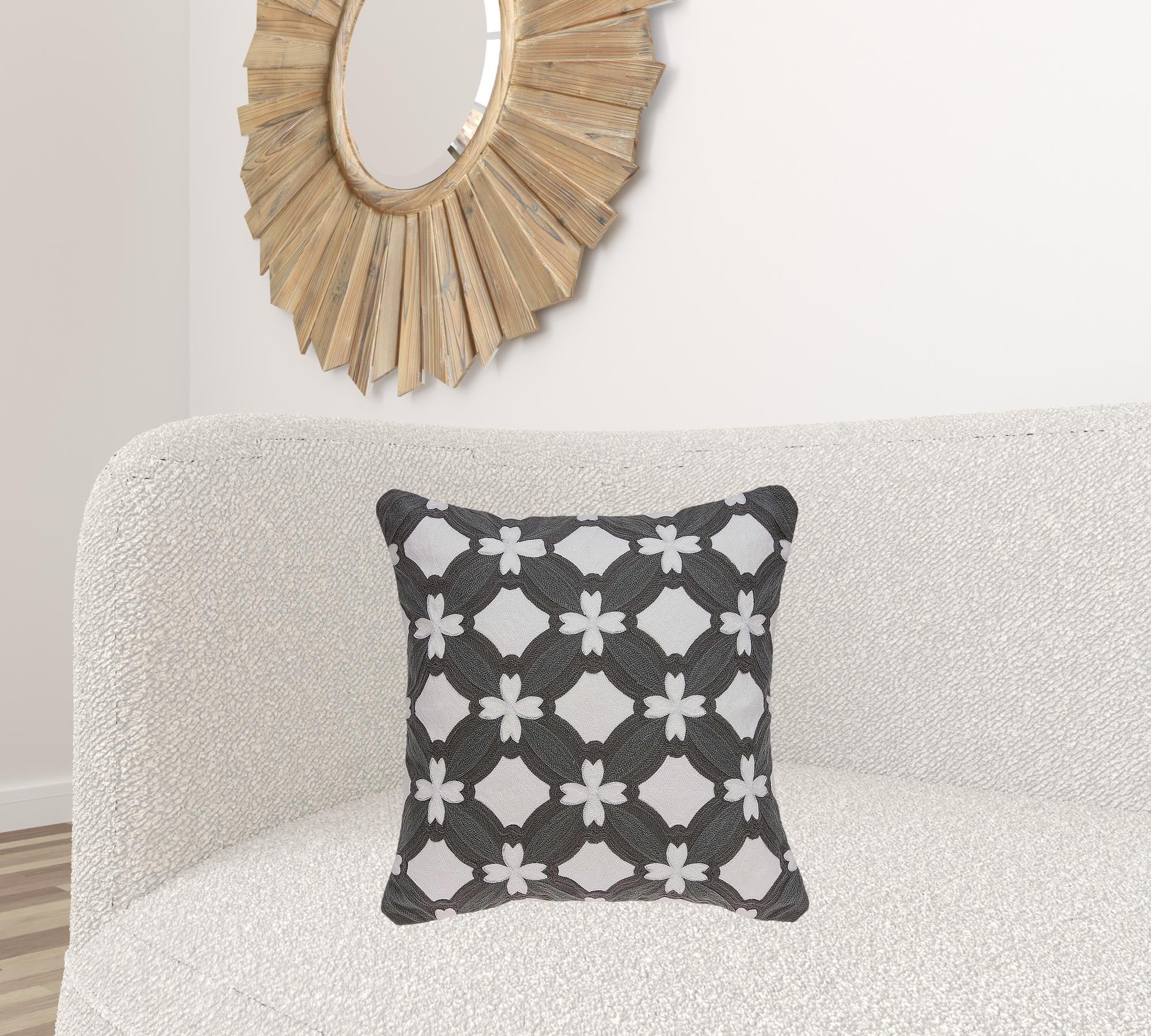 Transitional gray and white pillow cover measuring 20x7x20 inches, featuring a quatrefoil pattern and a soft cotton fabric.