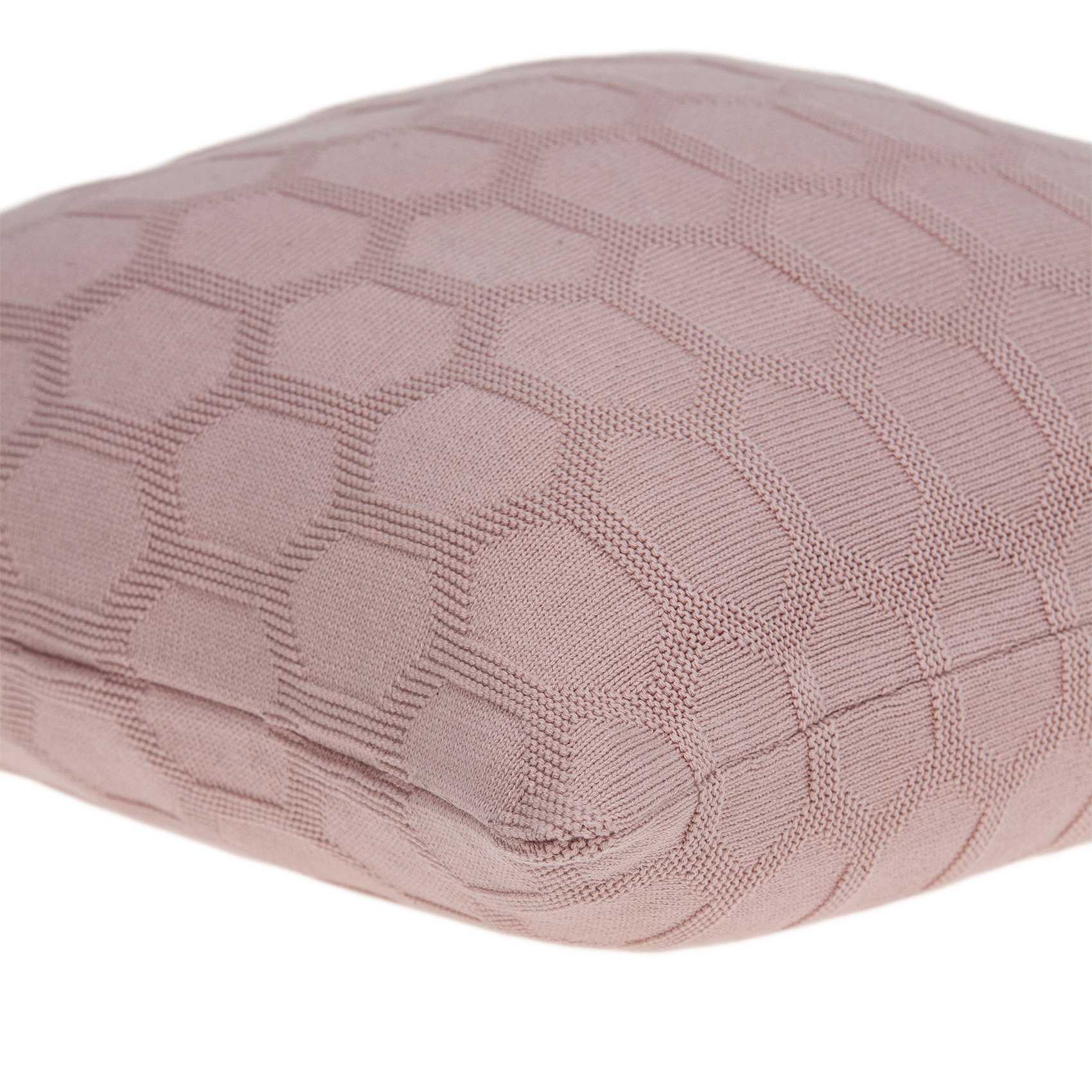 Transitional pink pillow cover measuring 20x7x20 inches, made from 100% cotton with a polyfill insert, featuring a honeycomb pattern.