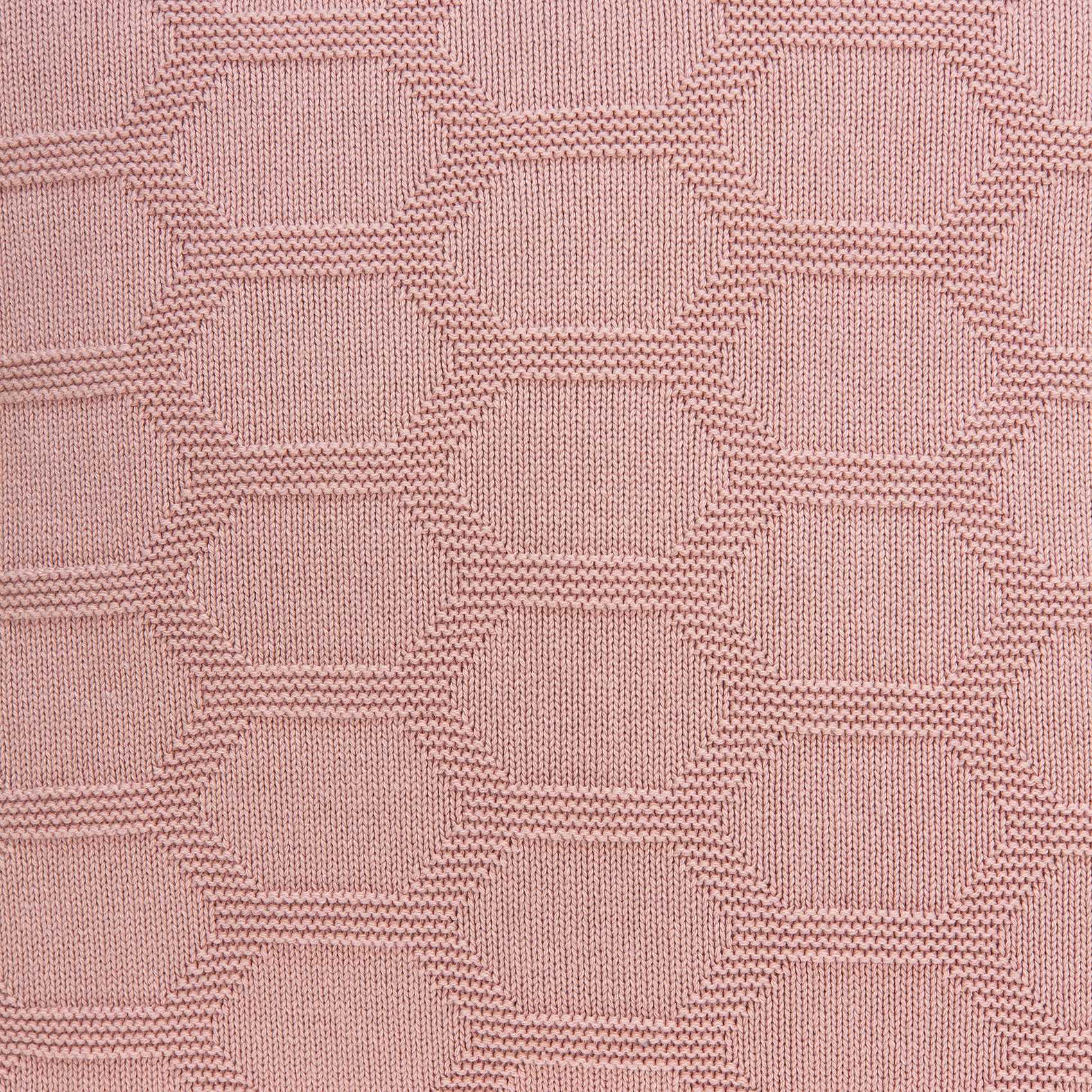 Transitional pink pillow cover measuring 20x7x20 inches, made from 100% cotton with a polyfill insert, featuring a honeycomb pattern.