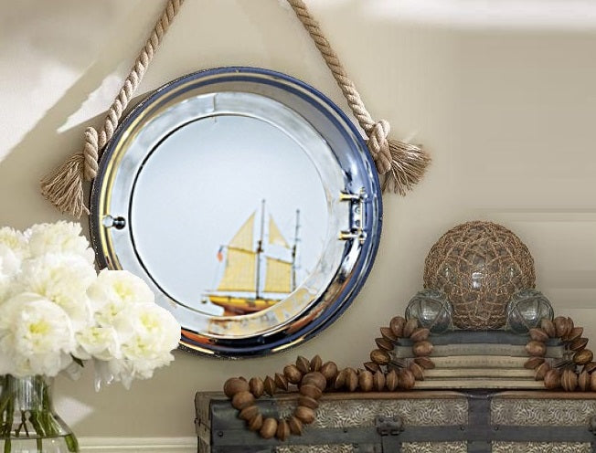 A stylish 21x21 inches aluminum wall mirror with a vintage porthole design, featuring a hinged storage compartment and a sleek nickel finish.