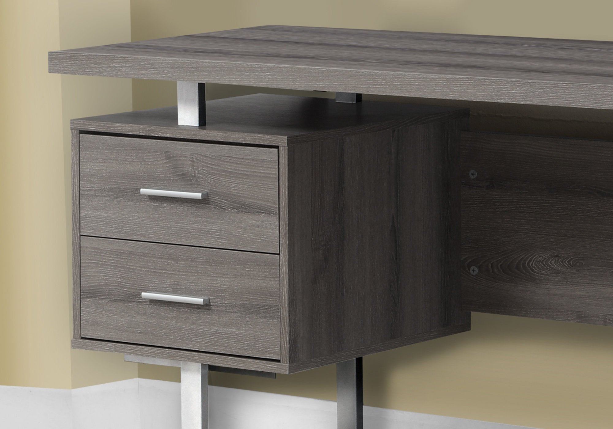 A modern white and silver particle board desk with two drawers and a cubby space, showcasing a glossy finish and sleek design.