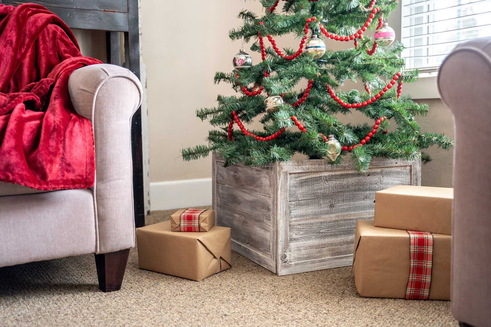 23-inch Gray White Wash Plank Christmas Tree Collar made from reclaimed wood, featuring a rustic design that enhances holiday decor.