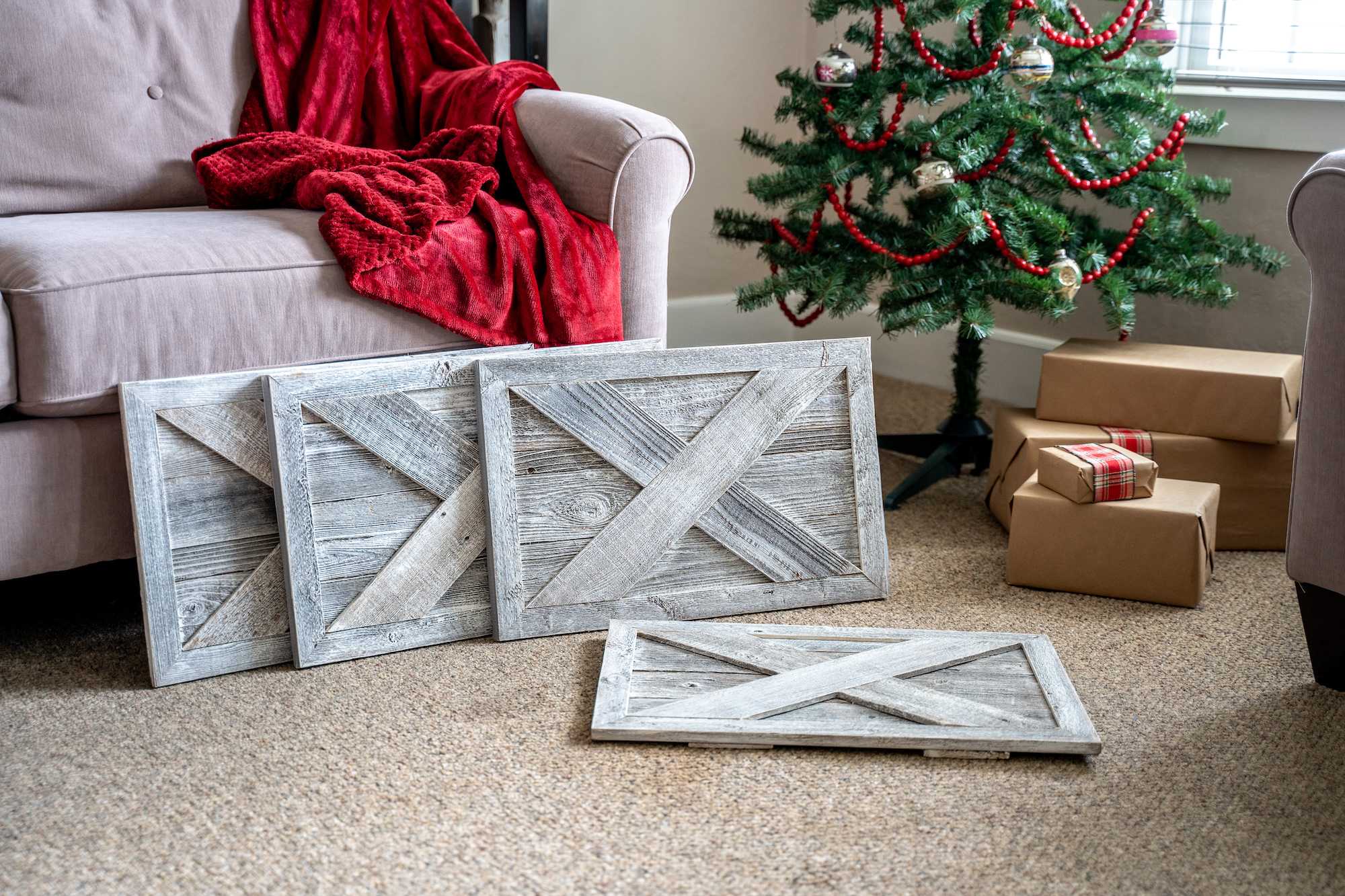 23-inch Natural Weathered Gray Whitewash Christmas Tree Collar featuring rustic X design, made from reclaimed wood, enhancing holiday decor.