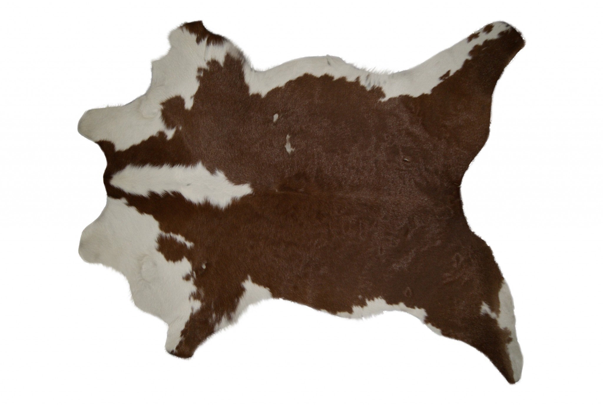 24x36 inches brown and white calfskin area rug showcasing its soft texture and elegant design, perfect for contemporary home decor.