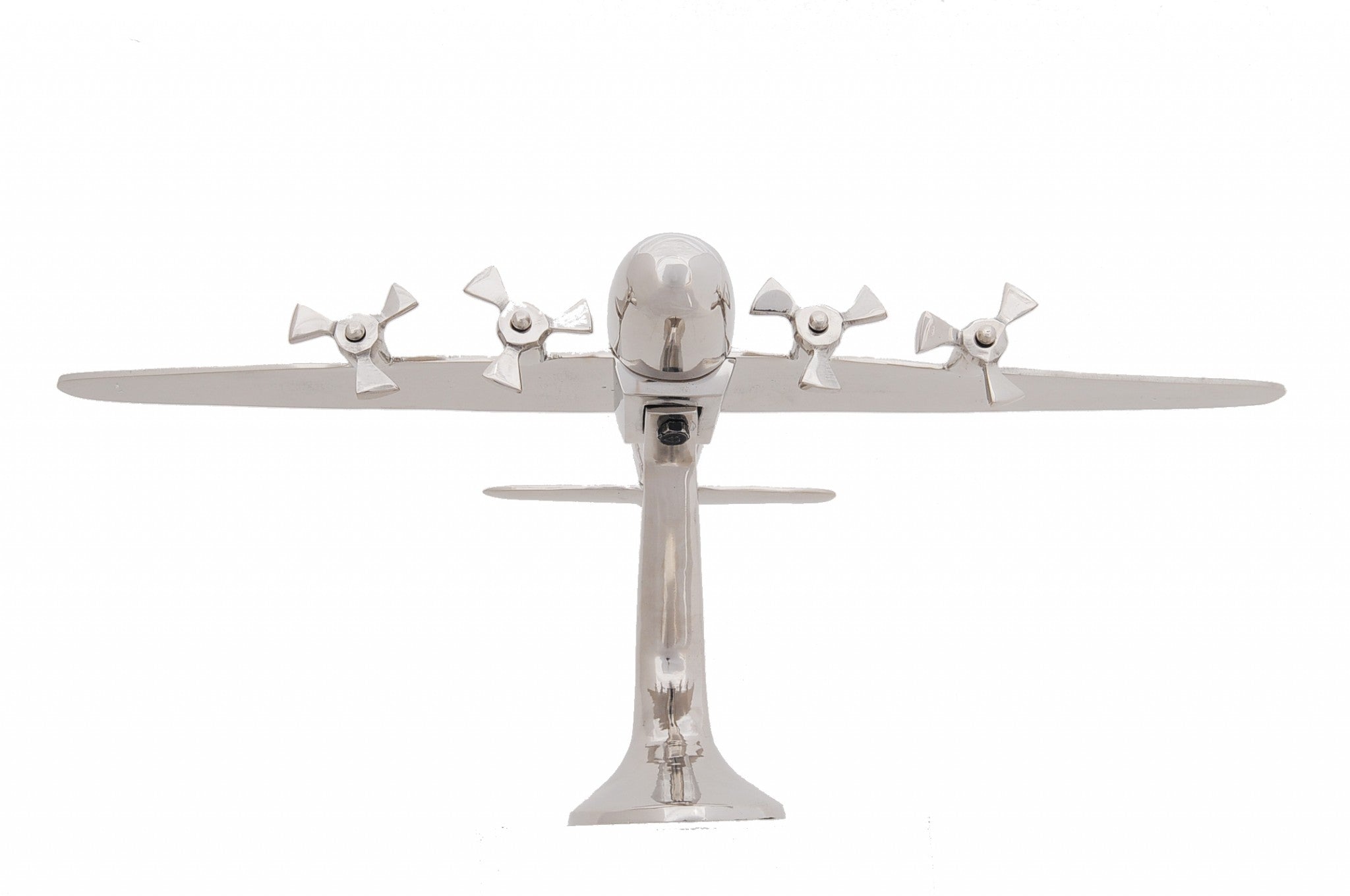 A detailed aluminum model of a WWII aeroplane with four spinning propellers, showcasing a shiny nickel finish.