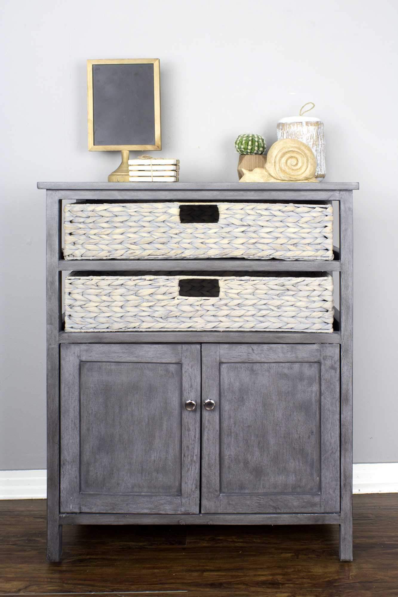 A stylish grey wood MDF accent cabinet with water hyacinth detailing, measuring 26.5" x 15" x 31.5", perfect for home organization.