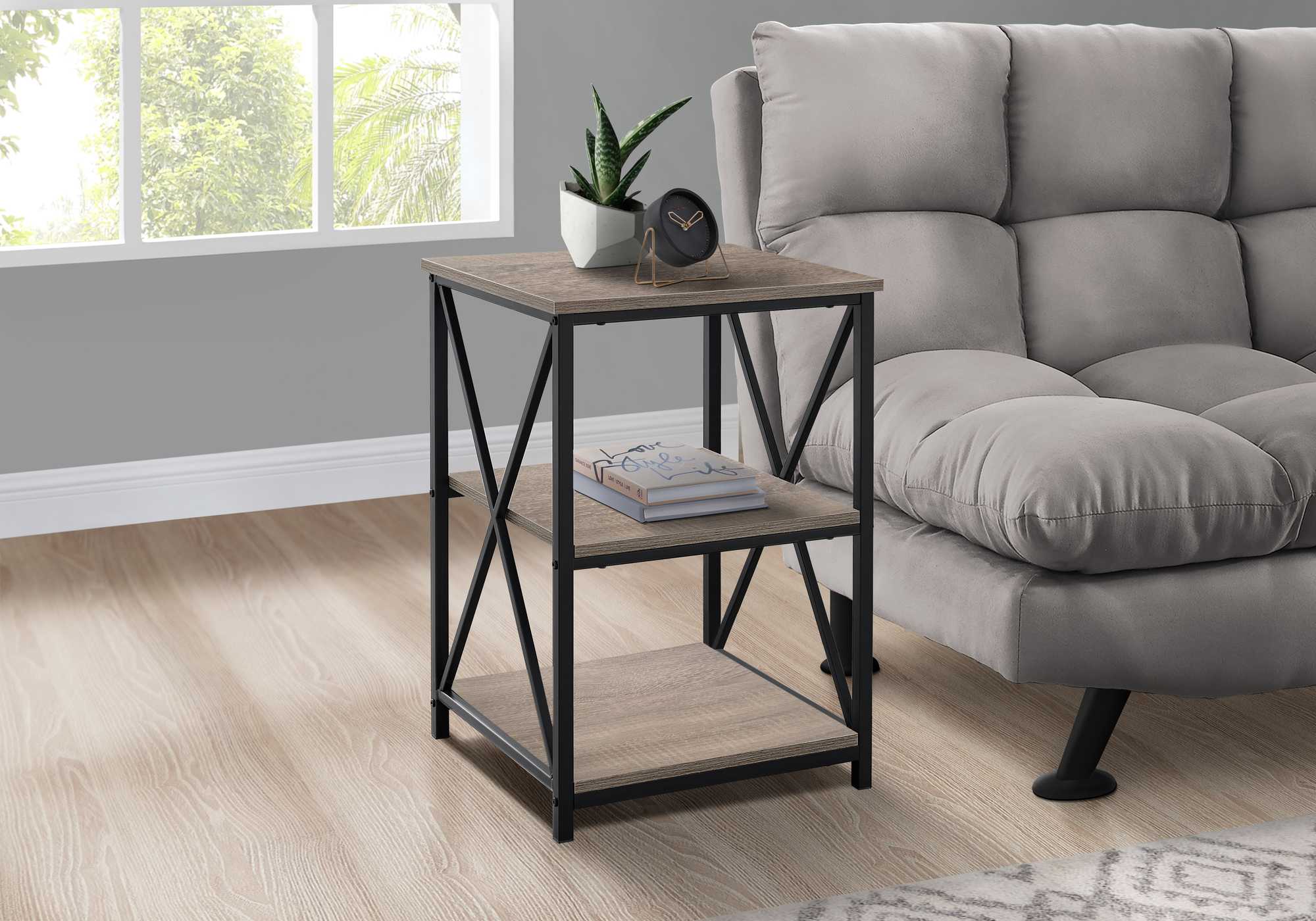 26-inch rectangular dark taupe black metal accent table with X design legs and two open shelves.