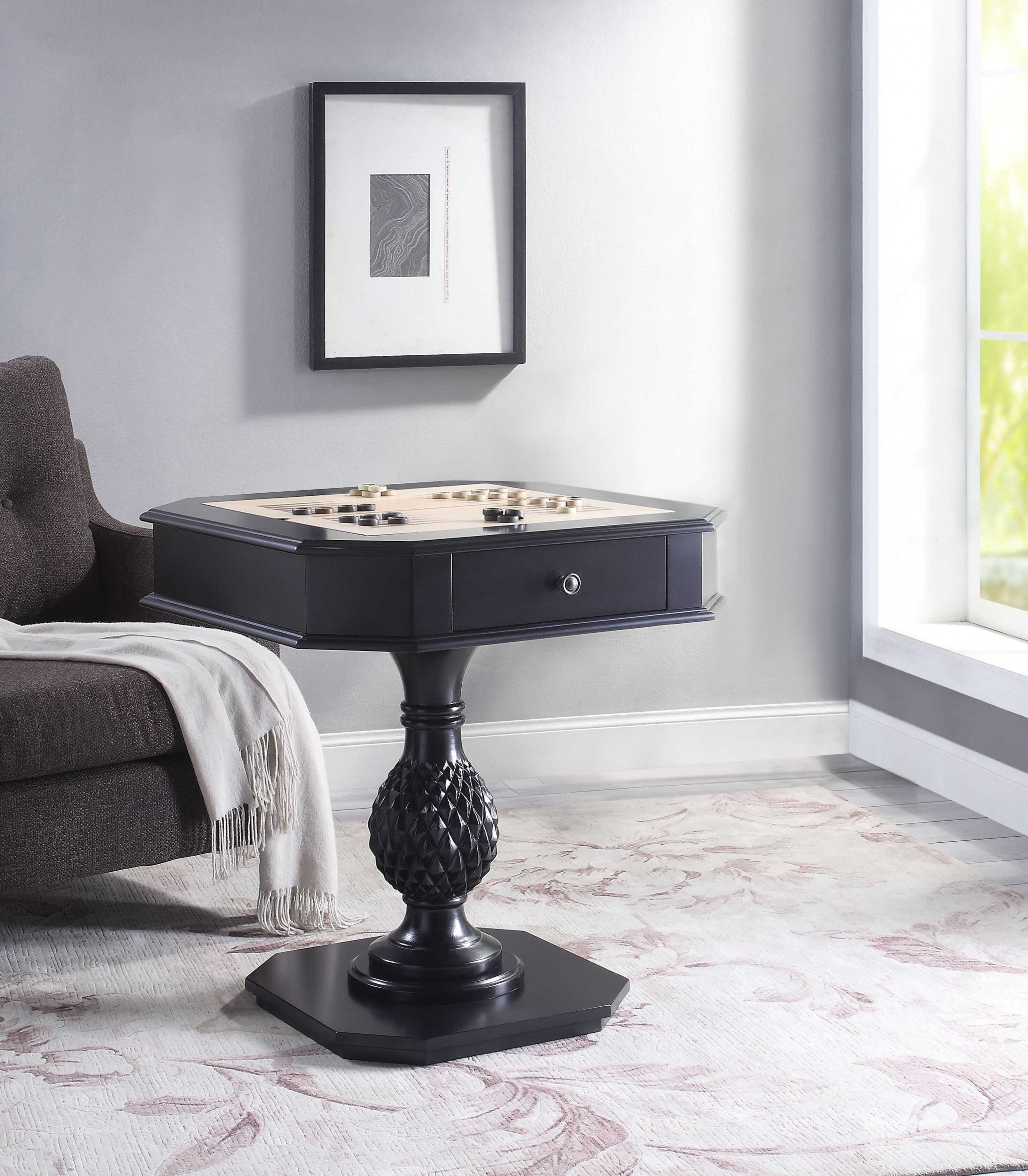 28 inches X 28 inches X 30 inches black wood poly-resin game table with intricate design and sturdy turned base, perfect for contemporary homes.