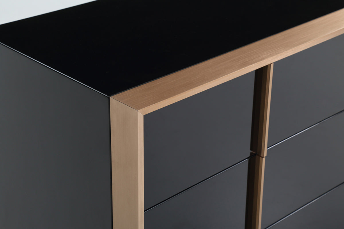 29 inches black and brushed bronze dresser with four drawers, showcasing a stylish design suitable for modern interiors.