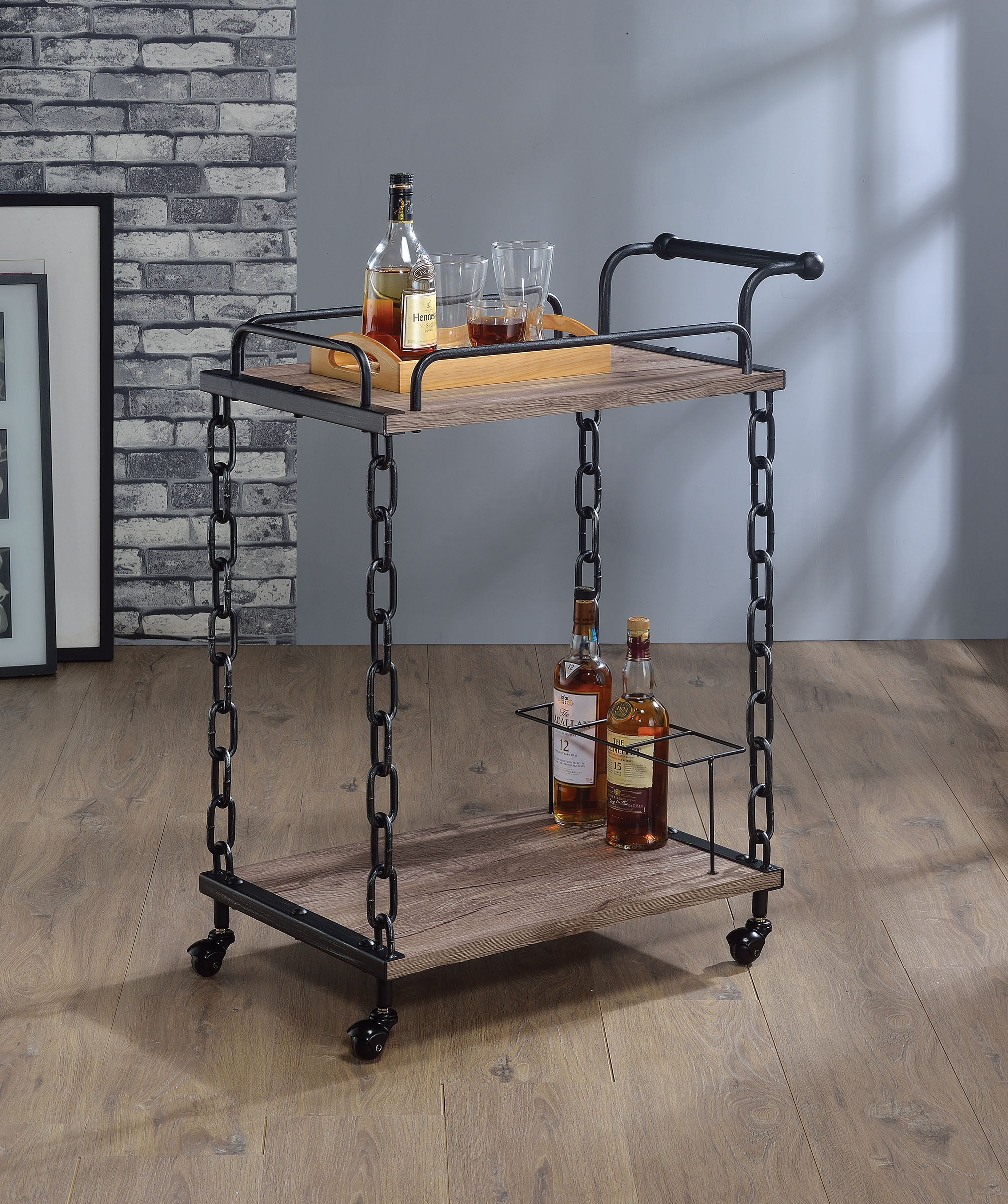 Rustic Oak and Antique Black Serving Cart with two shelves and wine bottle rack, featuring elegant caster wheels for mobility.