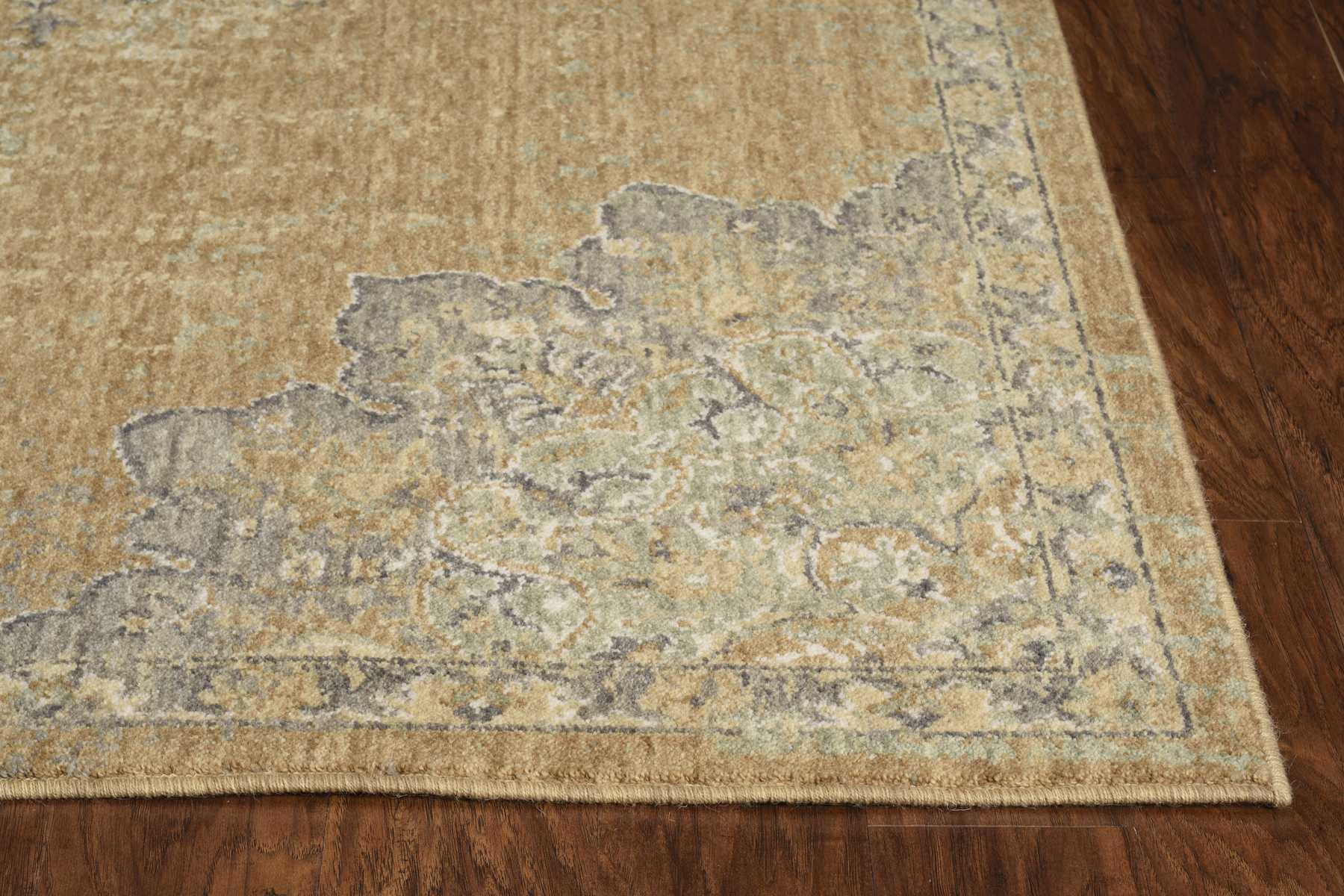 A 2x3 Coffee Vintage Wool Accent Rug featuring a traditional design with soft colors, perfect for enhancing living spaces.