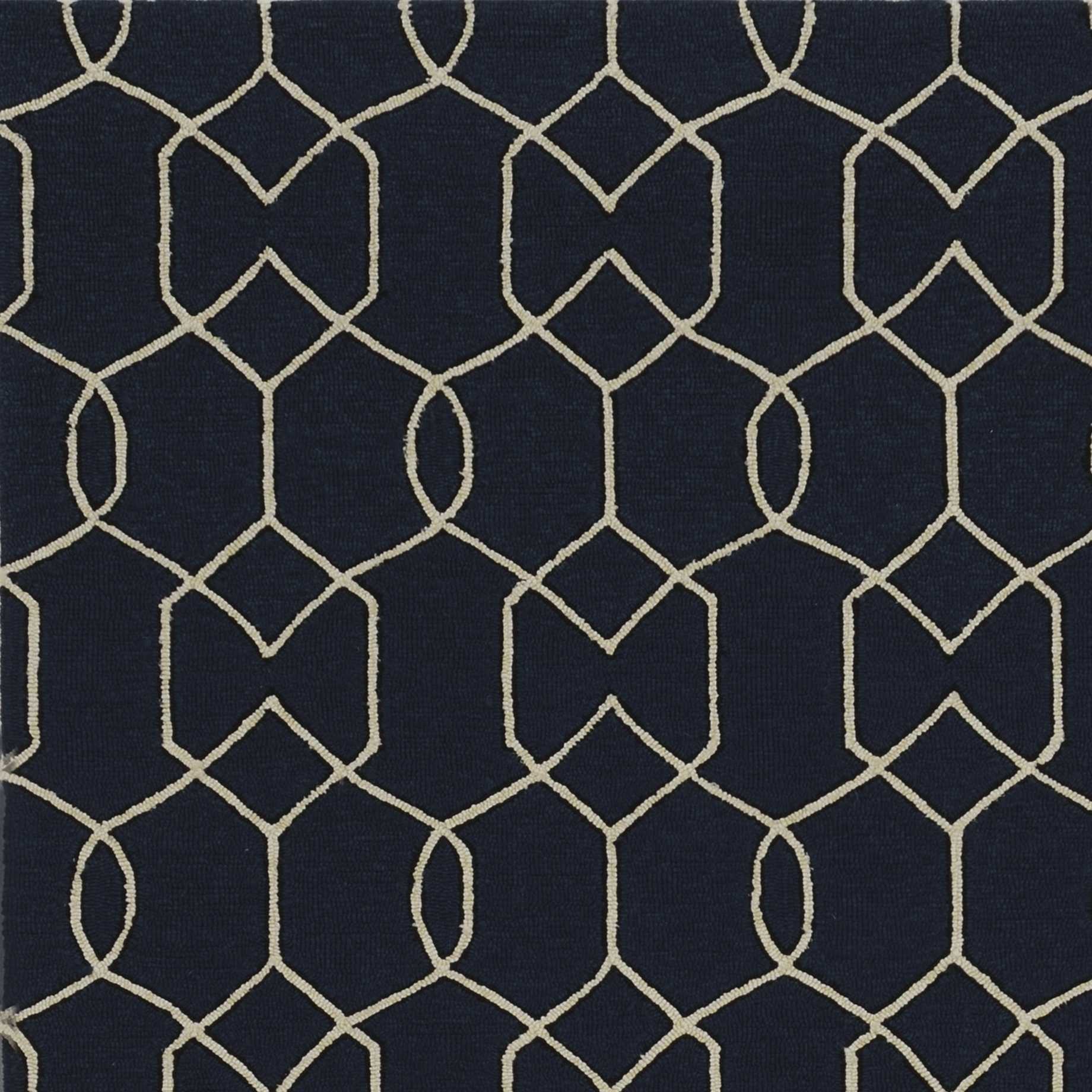 A stylish 2x3 navy accent rug made of UV treated polypropylene, showcasing a contemporary design suitable for indoor and outdoor use.