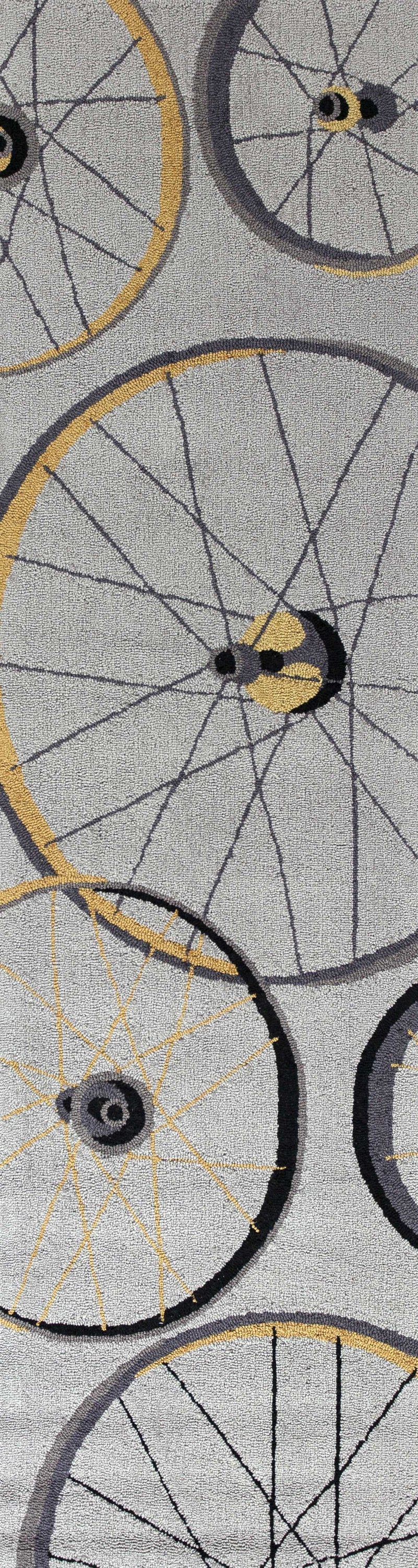 A stylish 2x7 inches grey wheels runner rug featuring a modern wheel pattern, perfect for enhancing home decor.