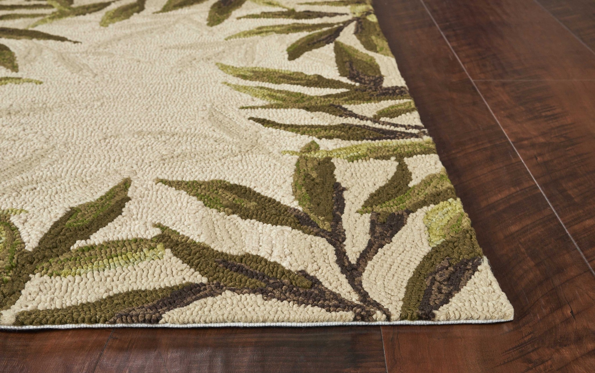 A 2x3 sand beige hand hooked rug with UV treatment, featuring a modern design suitable for indoor and outdoor use.