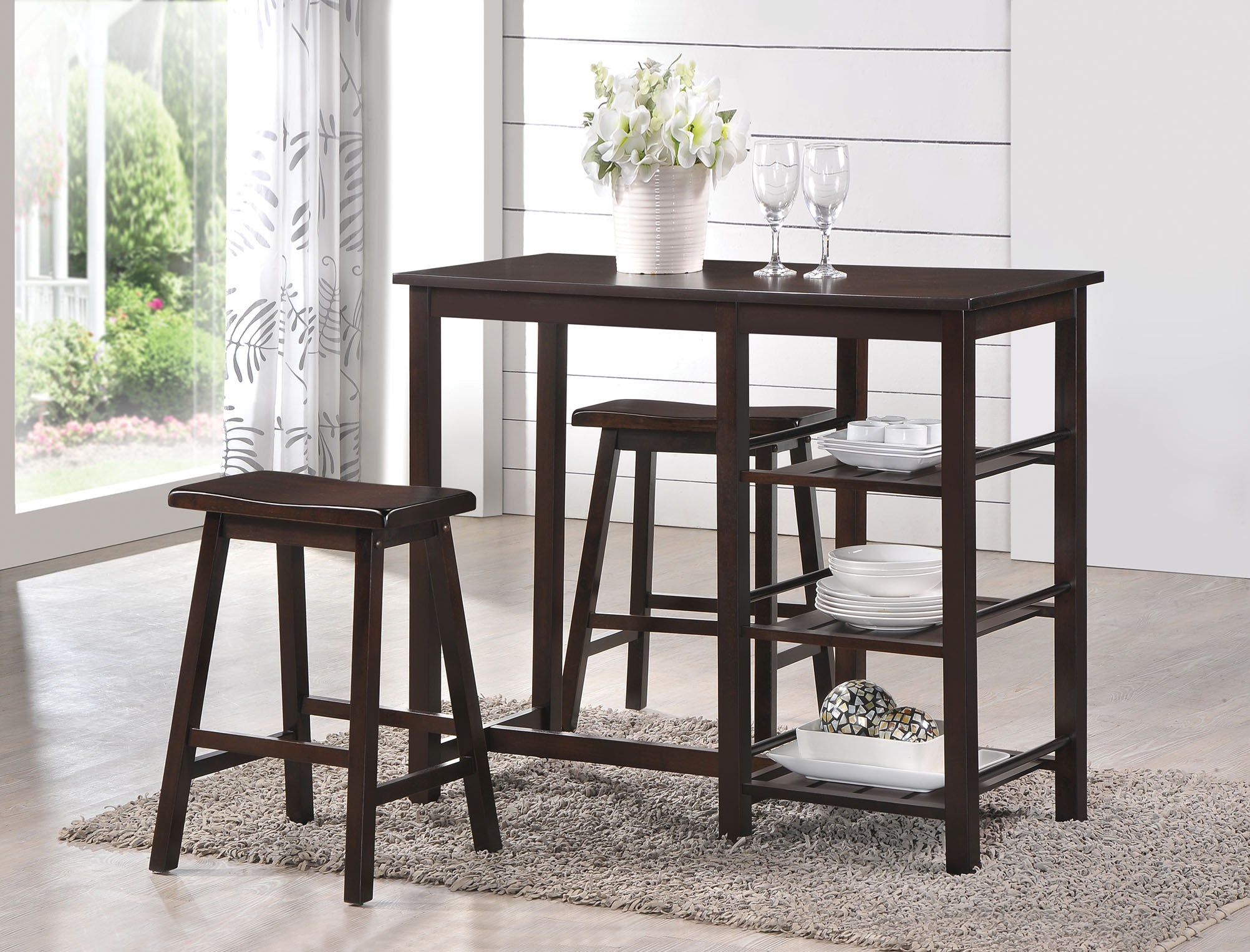 3 Piece Counter Height Set in Walnut featuring a rectangular table and two matching stools with wooden saddle seats.