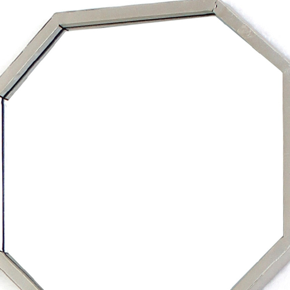 30.5 x 30.5 x 1 Silver Mirrored Metal Wall Sculpture featuring nine octagonal mirrors in a contemporary geometric pattern.