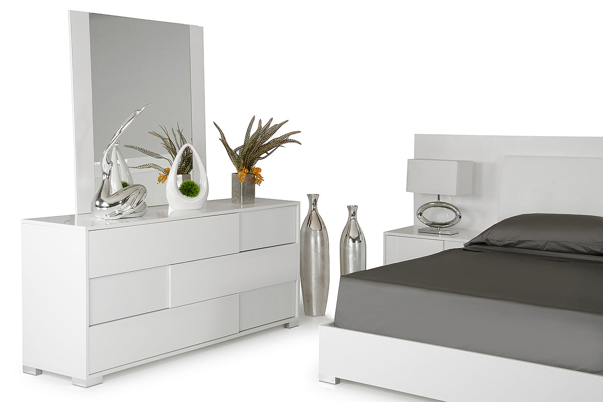 30-inch white MDF and steel dresser with three drawers, showcasing a modern design suitable for bedroom or living room.