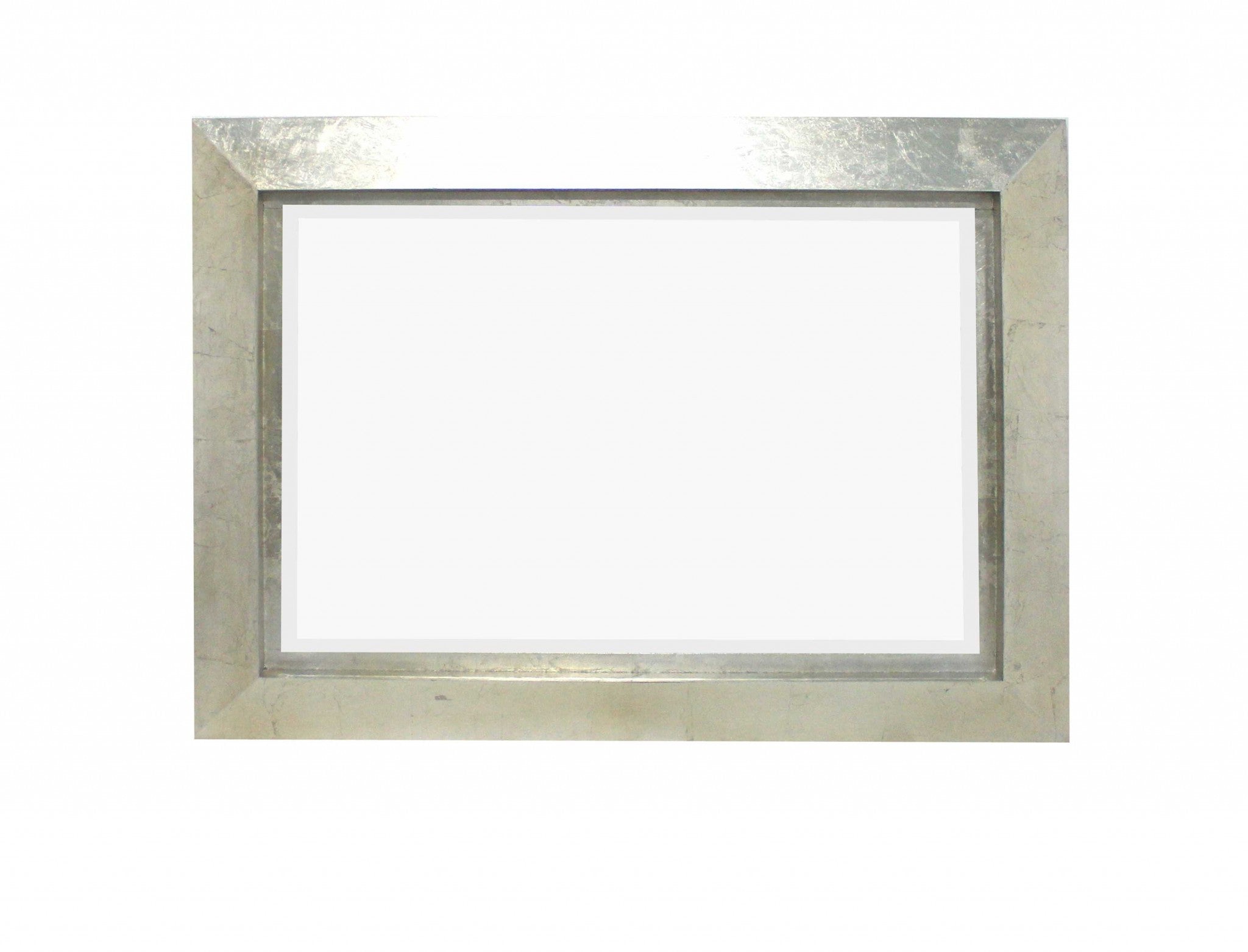 34 x 46 x 2.25 Silver Rectangular Cosmetic Mirror with a contemporary wooden frame and silver leaf finish, elegantly displayed on a wall.