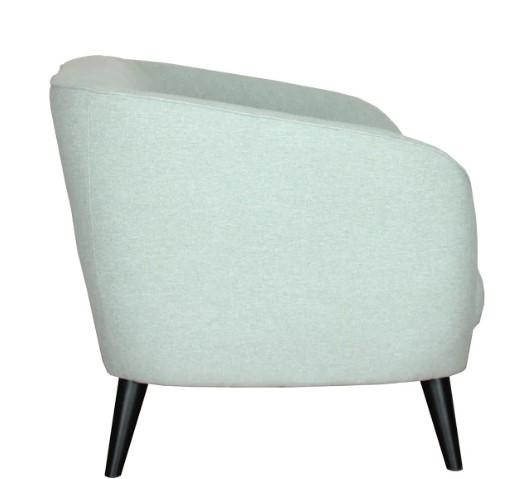 A stylish 35" X 34" X 32" mint polyester chair featuring sleek lines and modern curves, perfect for contemporary interiors.