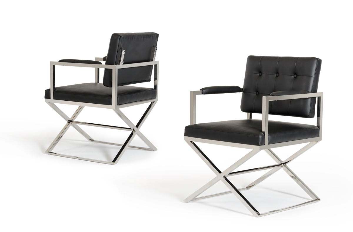 A stylish 35-inch black leatherette dining chair with stainless steel legs, showcasing modern design and comfort.