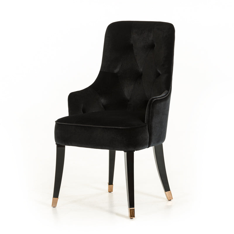 Elegant 38-inch black velvet fabric dining chair with sturdy wood legs, perfect for enhancing dining room decor.