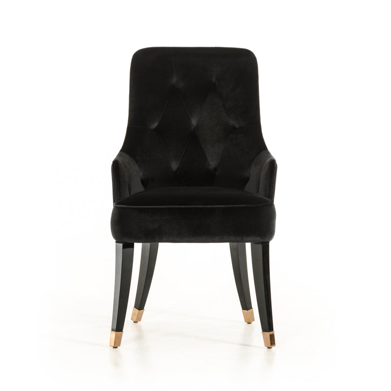 Elegant 38-inch black velvet fabric dining chair with sturdy wood legs, perfect for enhancing dining room decor.