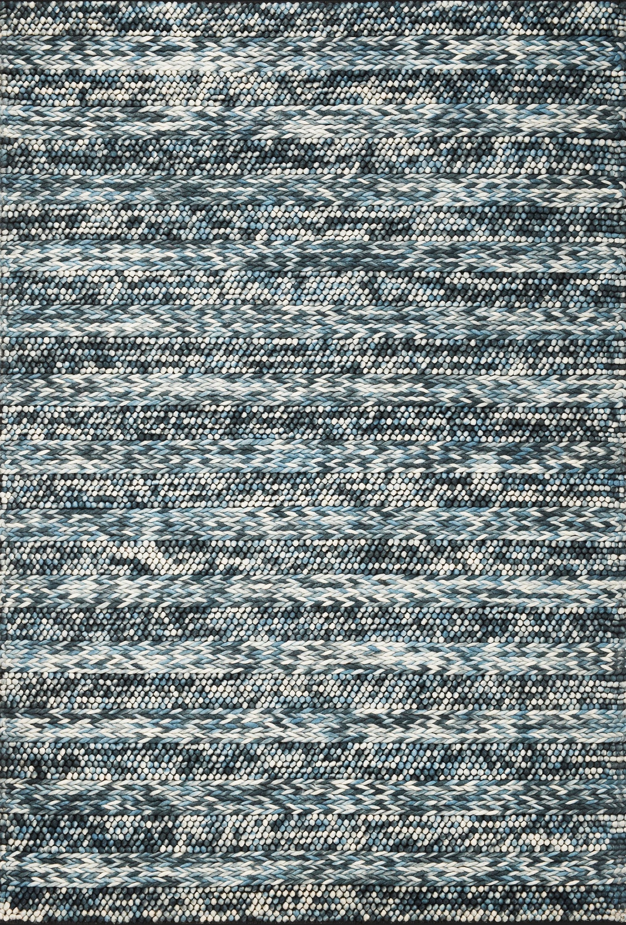 A handwoven 39 X 63 blue wool rug featuring a soft, nobby texture, perfect for contemporary living spaces.